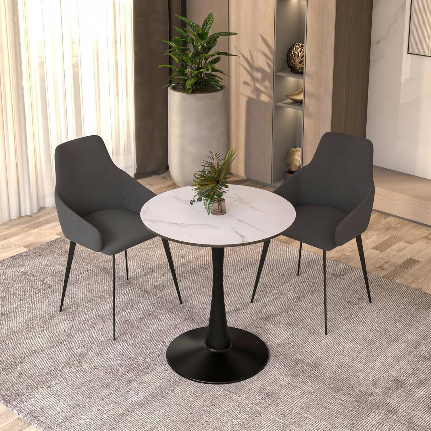 Angle. LeisureMod - Bristol 24 in. Round Dining Table – Modern MDF Top Accent Café Table & Sturdy Steel Black Pedestal Base - Marbled White.