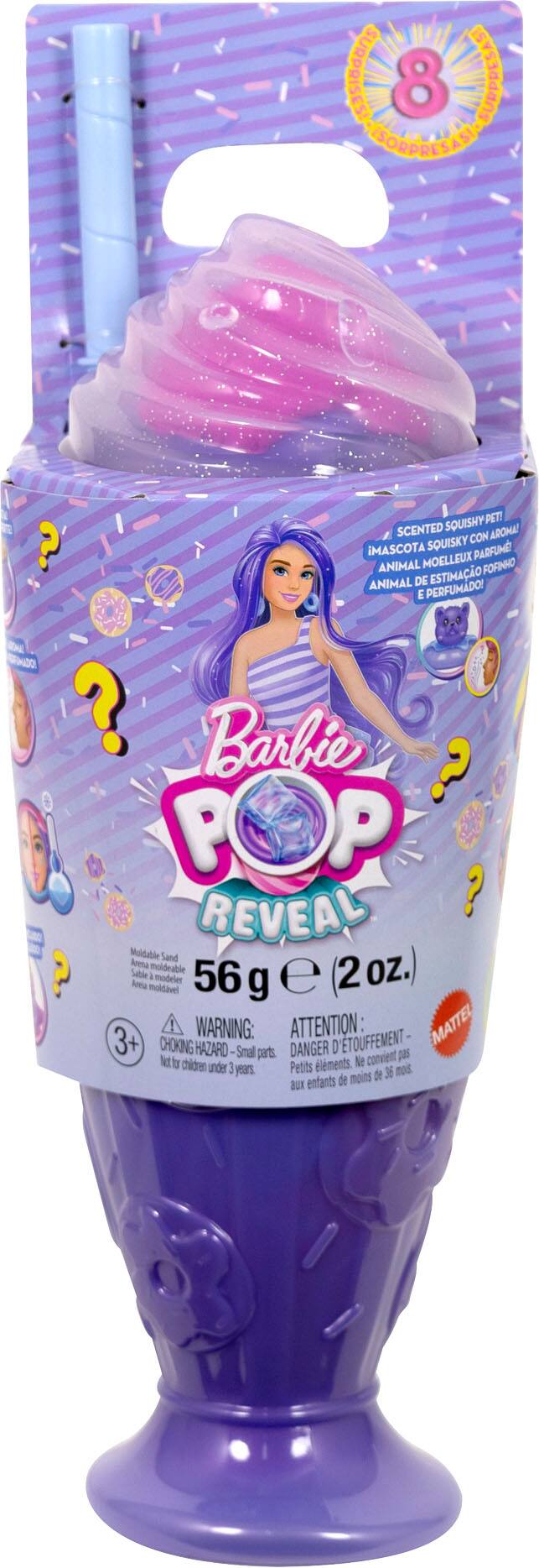 The text on the image is in Spanish, so I'll provide a translation:

"Barbie Pop: Reveal Moldable Sand (56 oz.) Scented with a pleasant aroma! ? The mascot Squishy Peti is soft and scented! ? Barbie Pop: Moldable sand modeler (2 kg) 3+ CHOKING WARNING: ATTENTION: Small parts. Not suitable for children under 3 years old. 36 months or less."

The text is grouped as follows:

1. "Barbie Pop: Reveal Moldable Sand (56 oz.) Scented with a pleasant aroma! ?"
2. "The mascot Squishy Peti is soft and scented! ?"
3. "Barbie Pop: Moldable sand modeler (2 kg) 3+ CHOKING WARNING: ATTENTION: Small parts. Not suitable for children under 3 years old. 36 months or less."