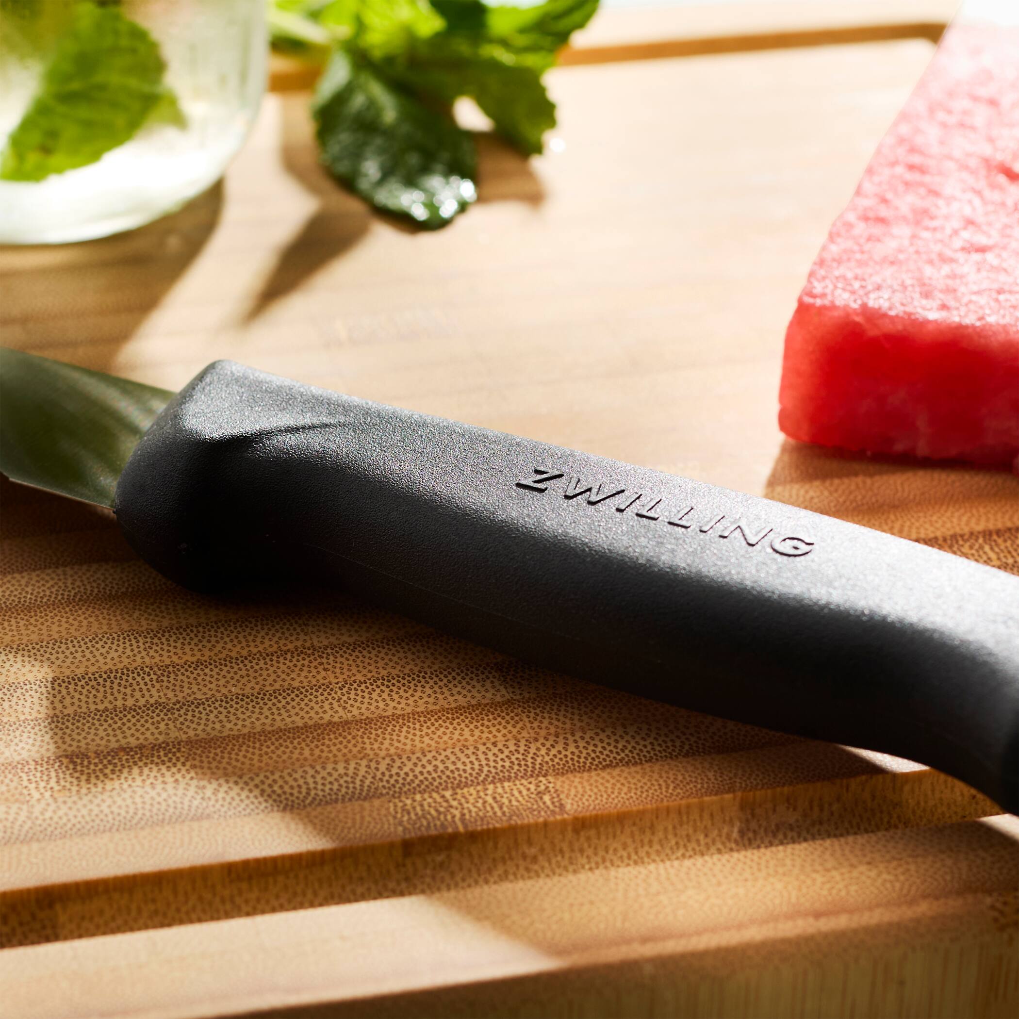 Alt View 4. ZWILLING - ZWILLING Commercial 10-inch Straight Serrated Edge Slicing Knife - Black.