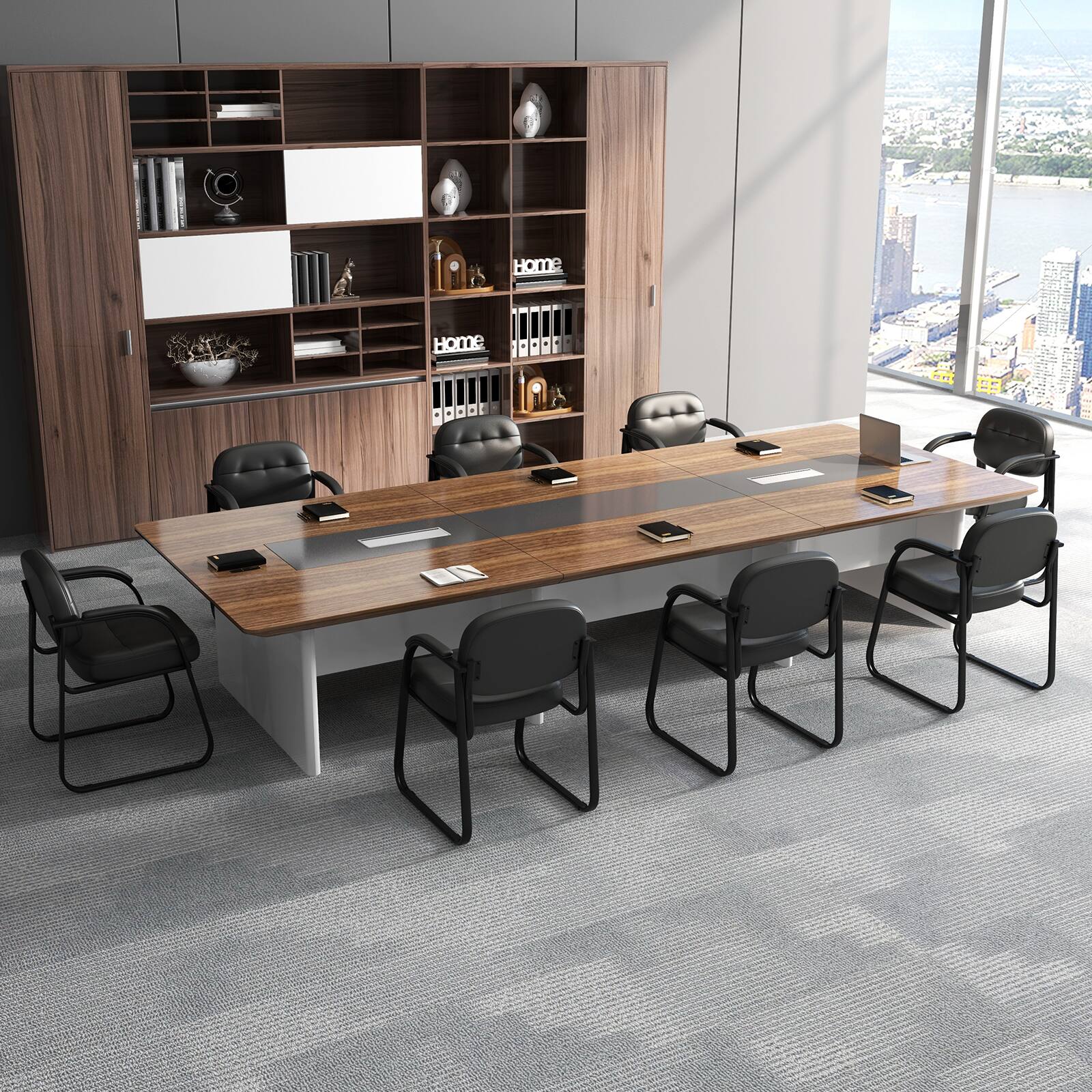 The image shows a large conference room with a long wooden table surrounded by black chairs. The table is set up for a meeting, with several books and a vase placed on it. The chairs are arranged around the table, with some facing the table and others facing the window. The room also features a large window that offers a view of the city. The overall setting suggests a professional and organized environment for business meetings or discussions.