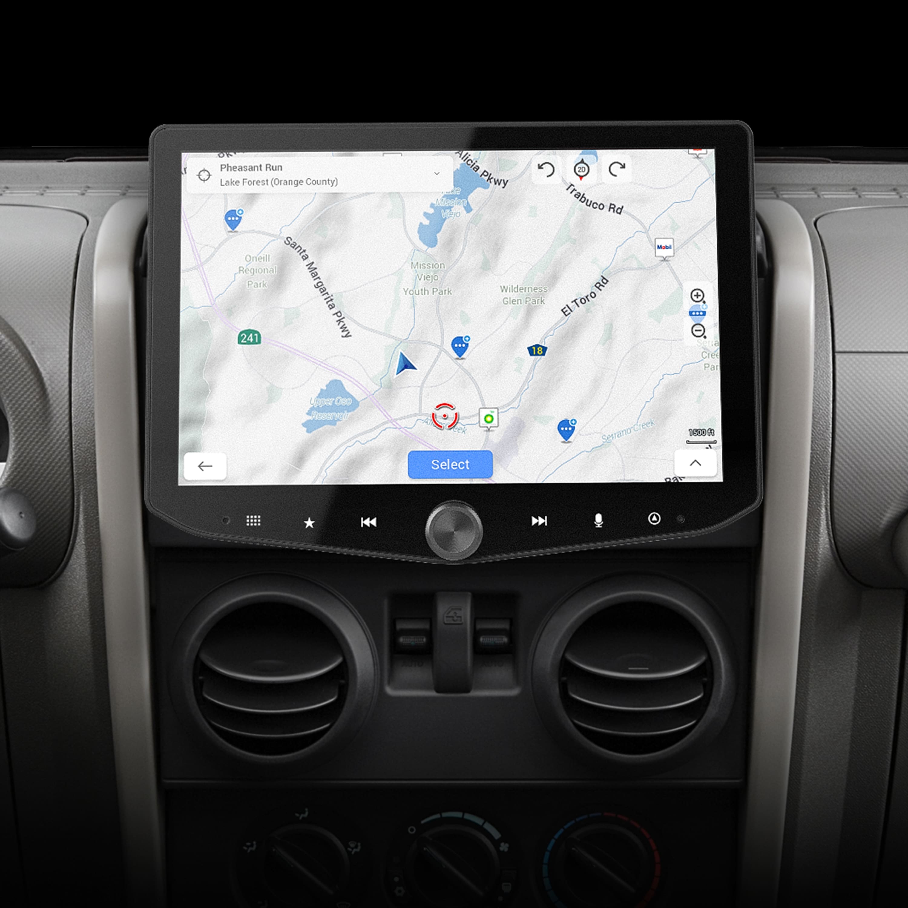 The image features a car's dashboard with a GPS navigation system. The text on the image reads "Pheasant Run Lake Forest (Orange County) Oneill santa Regional Park Margarita 241 Pkwy Alicia Pkwy Trabuco Rd Mission Viejo Youth Park Wilderness Rd Glen ark El-ToroRd El Toro ... - GA Cree Par Uaper Oeo Se Select Seerana-Ceek - AAT K4H." This text likely provides information about the current location or directions to nearby destinations.