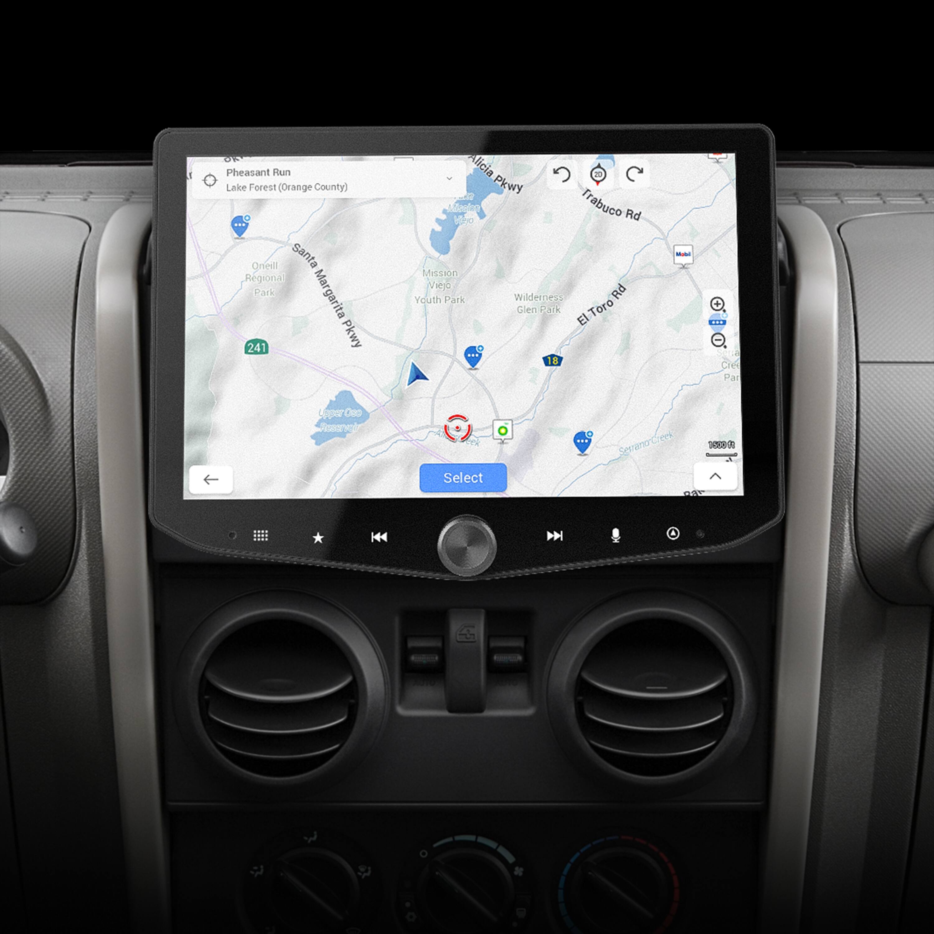 The image features a car's dashboard with a GPS navigation system. The text on the image reads "Pheasant Run Lake Forest (Orange County) Oneill santa Regional Park Margarita 241 Pkwy Alicia Pkwy Trabuco Rd Mission Viejo Youth Park Wilderness Rd Glen ark El-ToroRd El Toro ... - GA Cree Par Uaper Oeo Se Select Seerana-Ceek - AAT K4H." This text likely provides information about the current location or directions to nearby destinations.