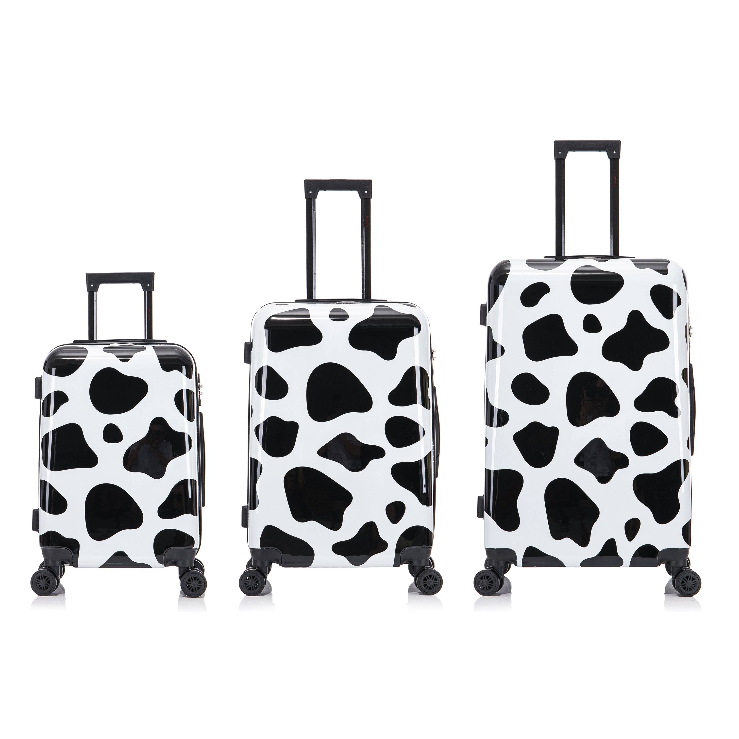 Angle. InUSA - Cow Prints lightweight hardside Spinner 3 Piece Luggage Set 20"/24"/28" - COW.
