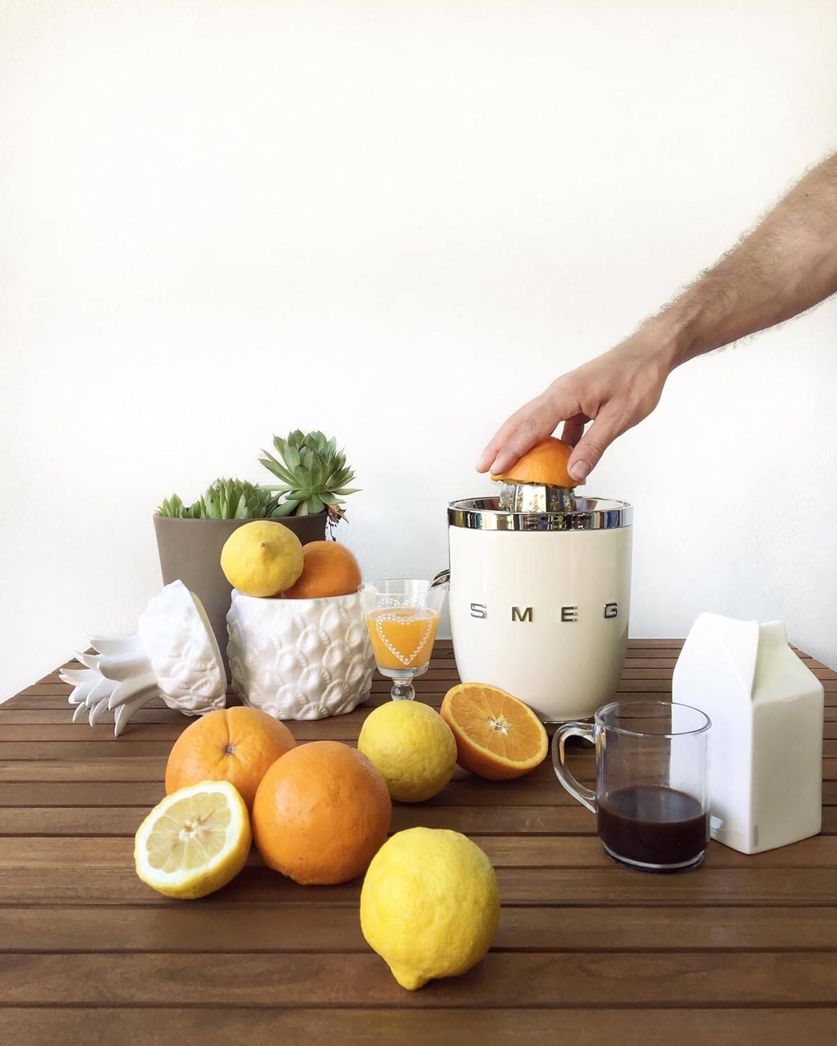 Left. SMEG - CJF11 Citrus Juicer - Cream.