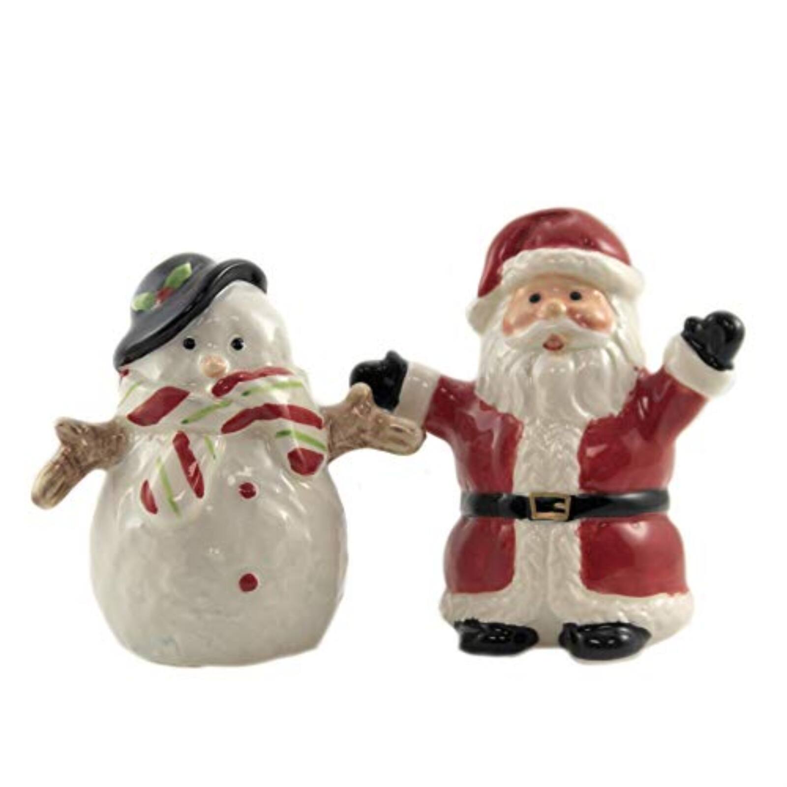 Angle. Pacific Trading - Christmas Santa & Snowman North Pole Winter Ceramic Magnetic Salt Pepper Shakers - Multicolor.