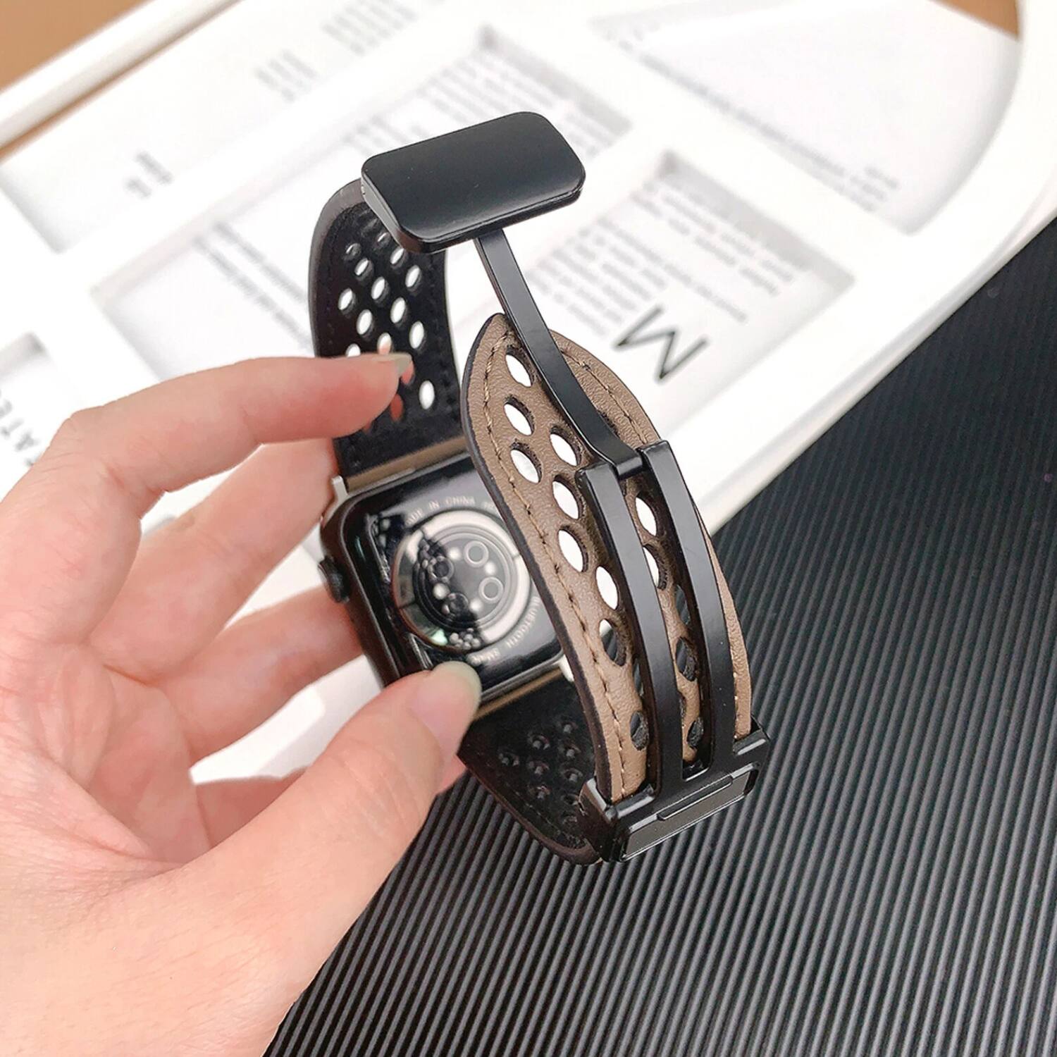 The text on the image appears to be "M I CHINA - UETORT NE". However, it seems to be a bit unclear and might be part of a larger text or design. If you need it corrected or grouped differently, please provide more context or a clearer image.