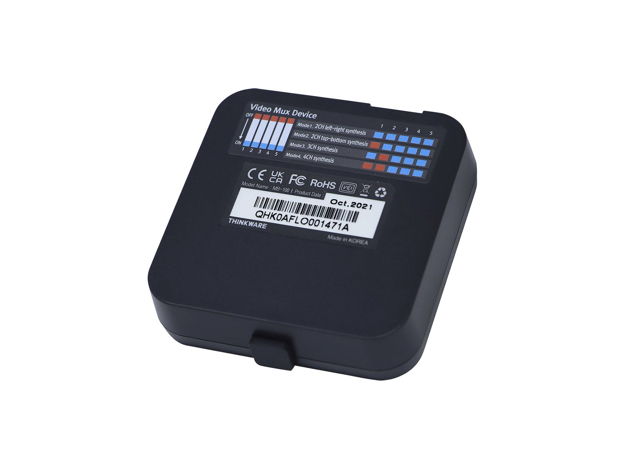 The text on the image reads:

Video Mux OFF Device Mode1. 2CH left I 2 Mode2. right synthesis 12345 3 5 2CH top-bottom top- ON Mode3. synthesis 3CH synthesis 12345 Mode4. 4CH synthesis CE CA UK FC Model Name MB-100 RoHS VEI I Product Date Oct.2021 THINKWARE QHK0AFLO001471A 0001471A Made in KOREA