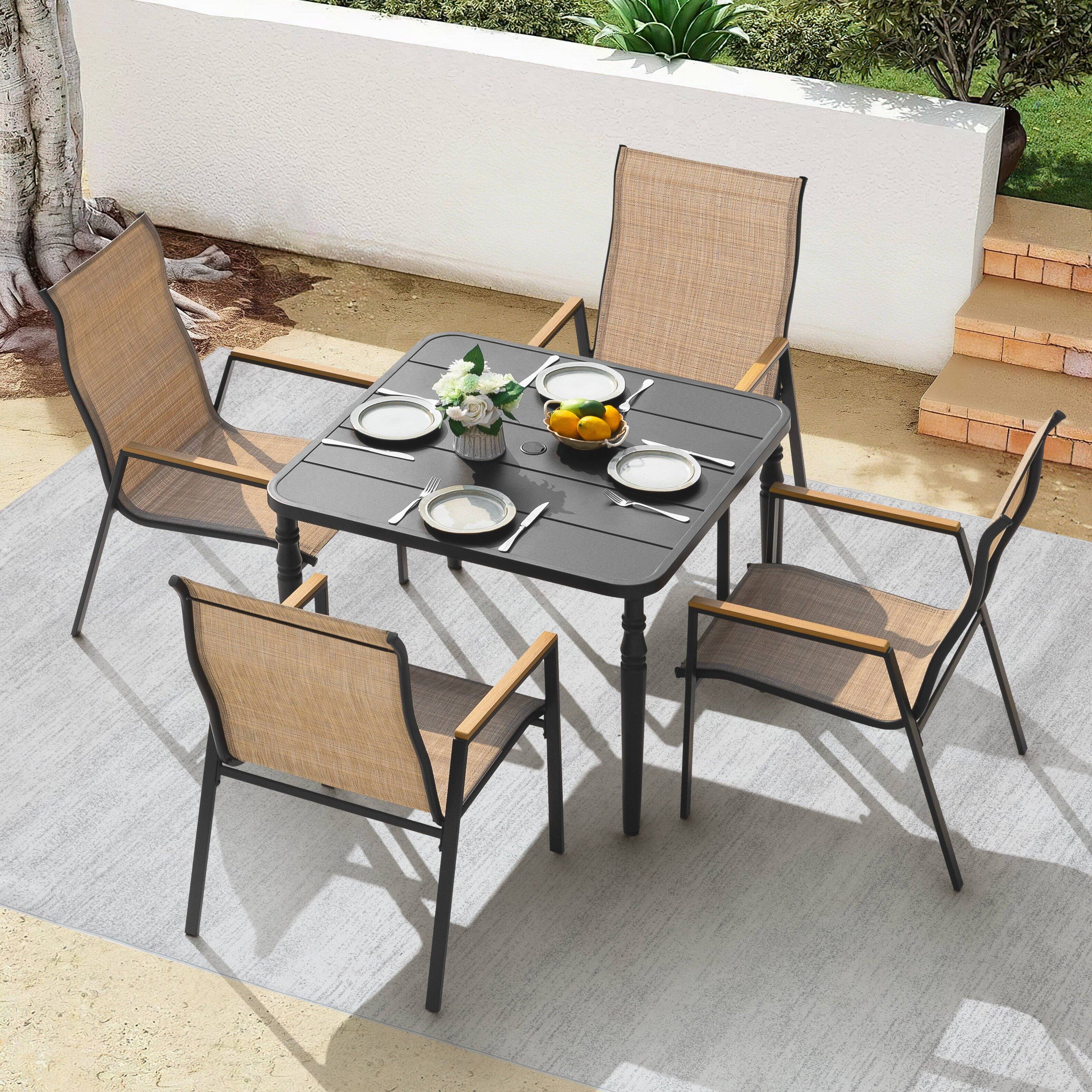 Left. Nuu Garden - 5-Piece Textilene Patio Dining Set with Umbrella Hole, Stackable Design, Faux Wood Armrests - Black and Khaki.
