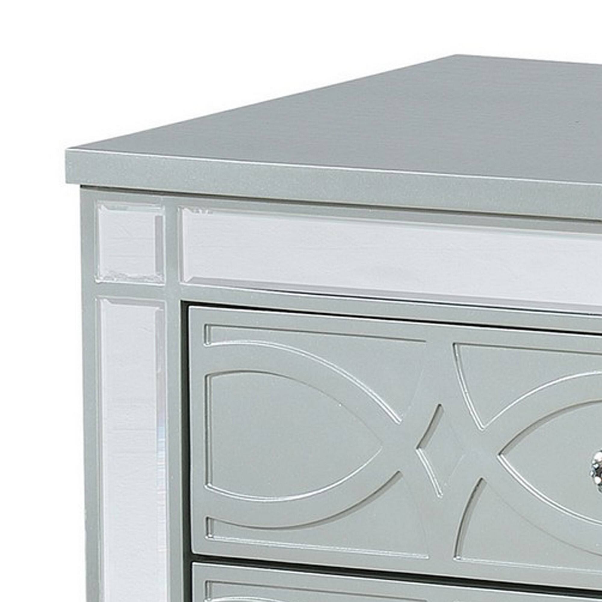Angle. Manhattan Lane - Gina 29 Inch Modern Glam Nightstand, Round Crystal Knobs, USB Ports - Silver.