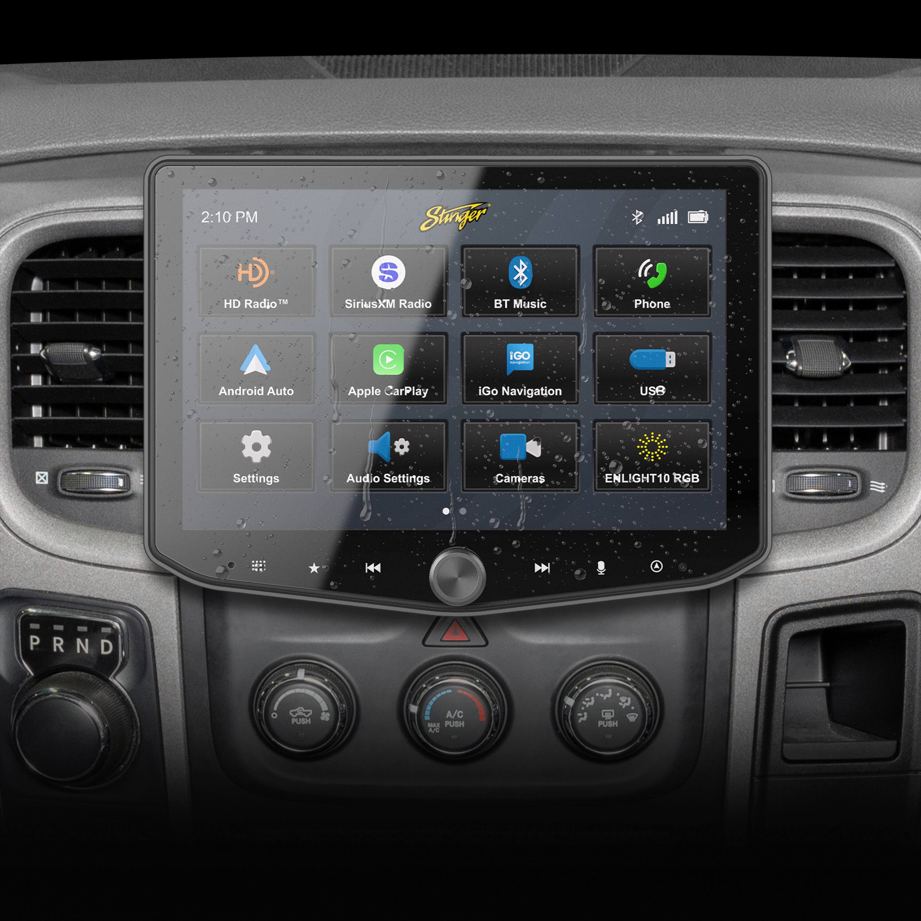 The text on the image reads:

2:10 PM
Stinger HD
HD Radio
iHeart Radio
BT Music
Android Auto
Apple CarPlay
iGO Navigation
USB
Settings
Audio Settings
Cameras
ENLIGHT10 RGB
K44 D
PRND
P N D
a PUSH
A/C - PUSH -d
$
PUBH