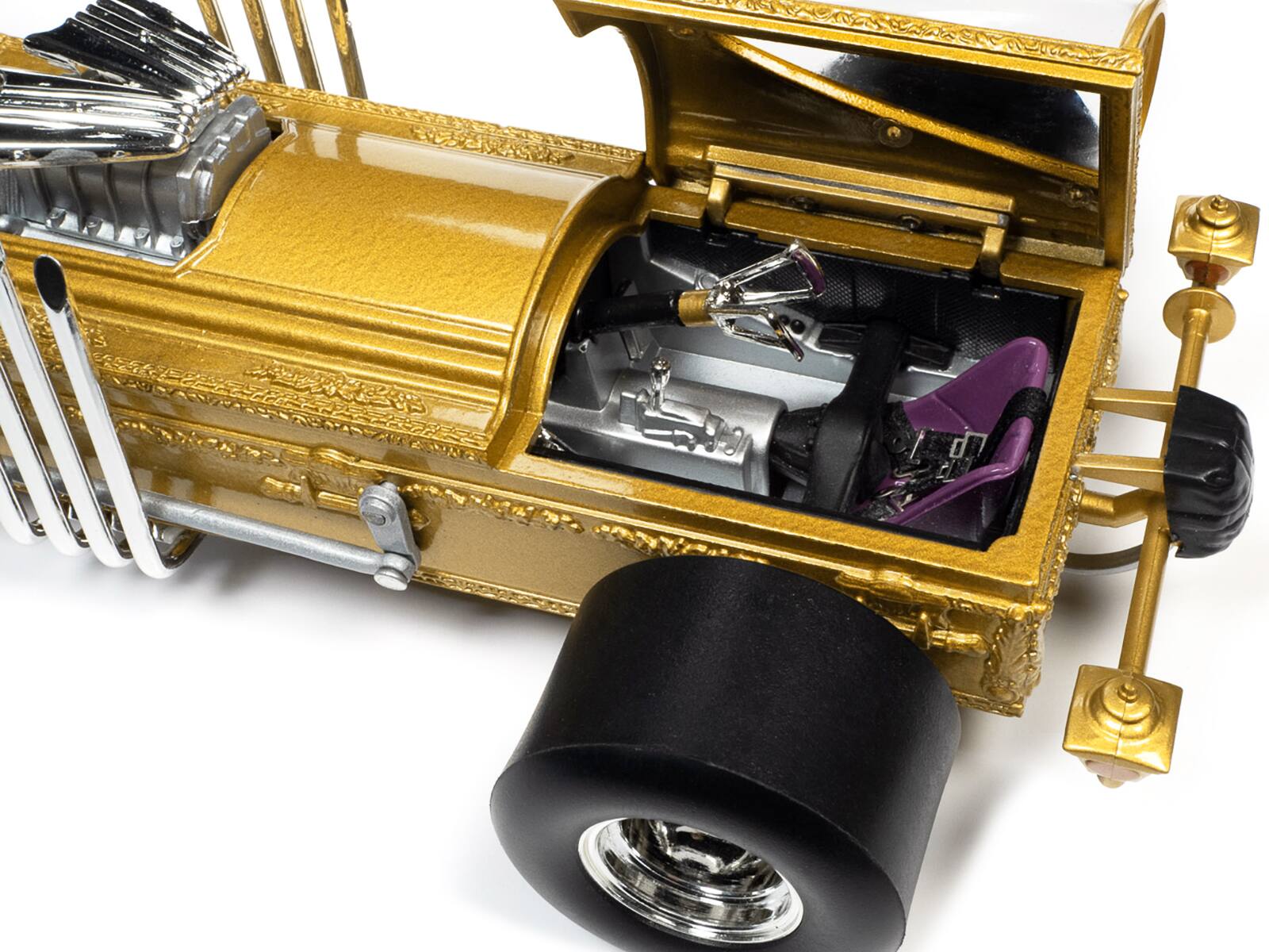Left. Autoworld - George Barris' Drag-u-la Gold "The Munsters" (1964-1966) TV Series "Silver Screen Machines" Series 1/18 - Gold.