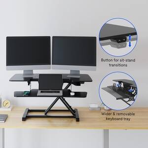 Button for sit-stand transitions  
Wider & removable keyboard tray