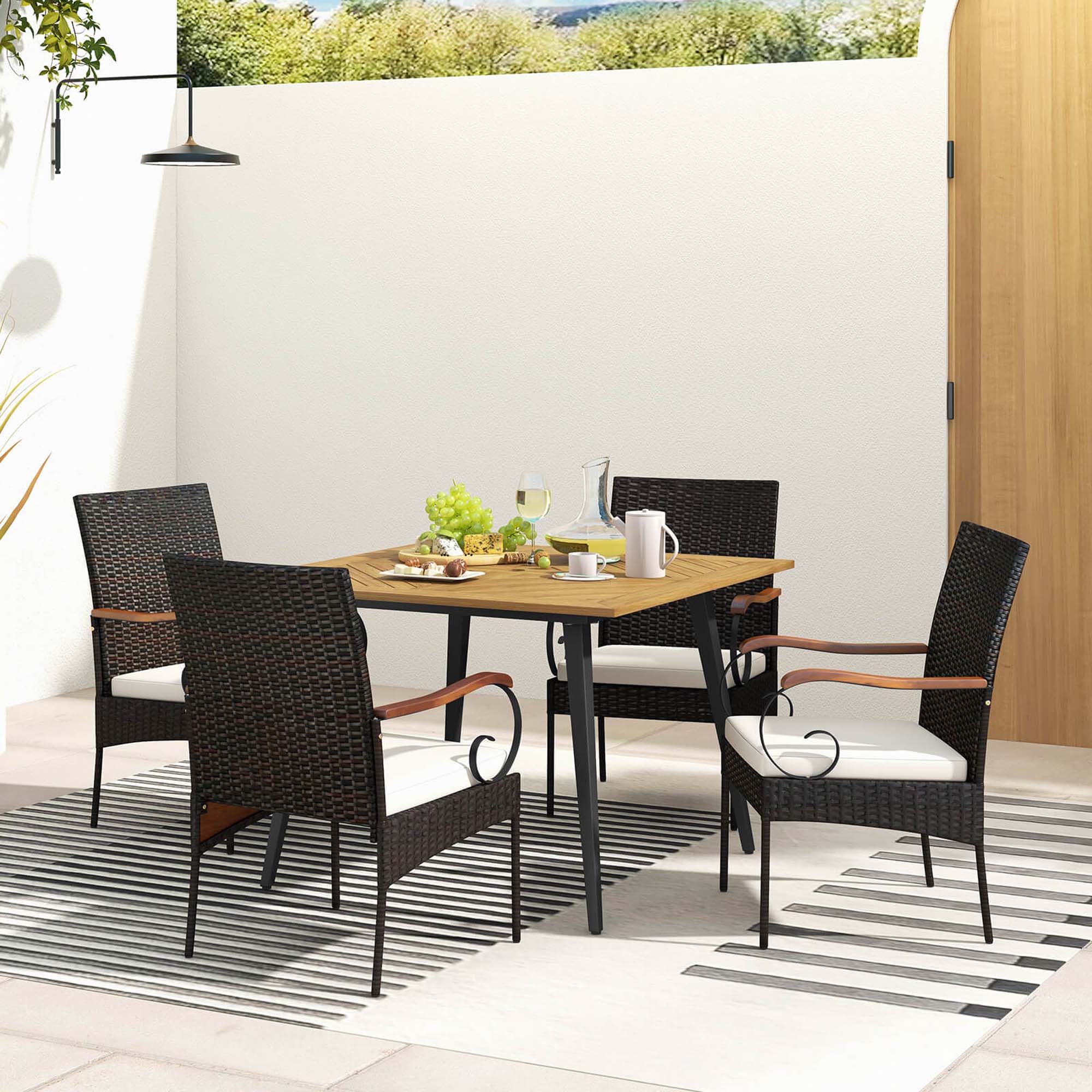Back. Costway - 5 PCS Patio PE Wicker Dining Set Table and Chairs with Cushions 1.9" Umbrella Hole - Mix Brown + Off White.