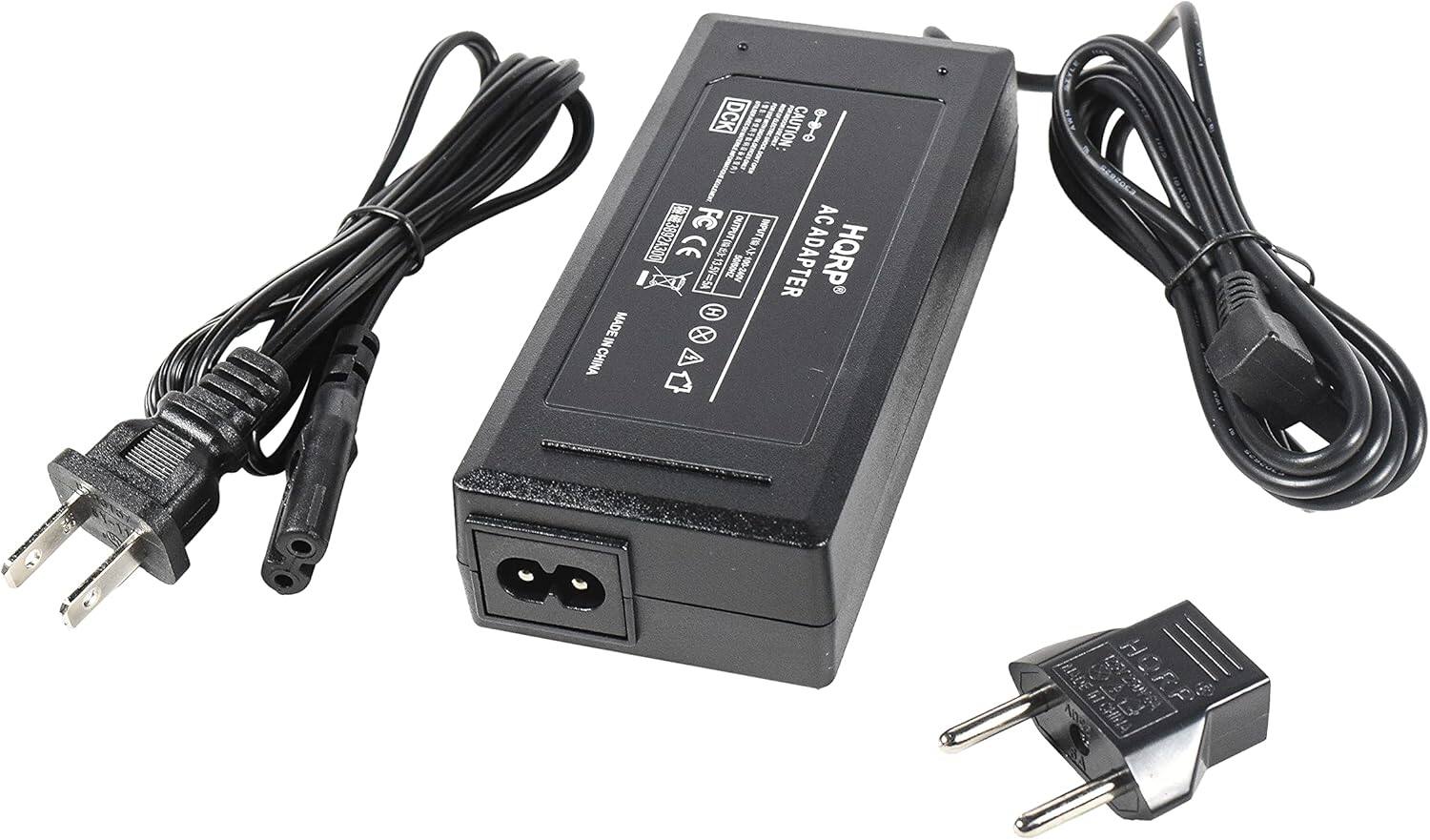 DCX CAUTION: DRASR I ho_nb FC Unnece Min_totscibe AC 3892A300 " I Te  ADAPTER HQRP = ZHOSOS 100-340V B H MADE IN CHINA