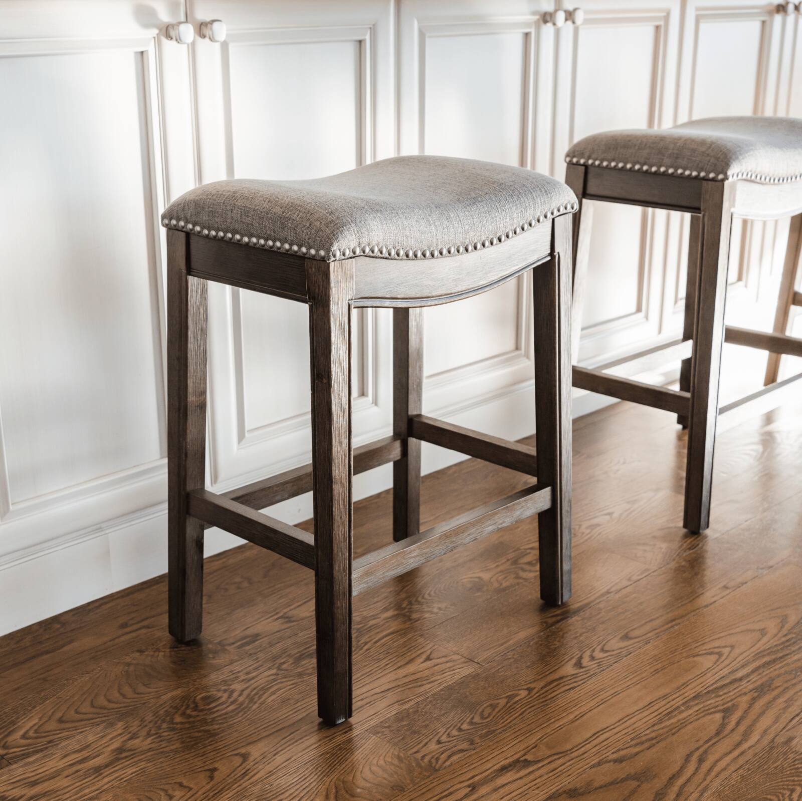 Angle. Maven Lane - 26" Adrien Backless Saddle Counter Stool in Walnut Finish with Fabric Upholstery - Walnut.