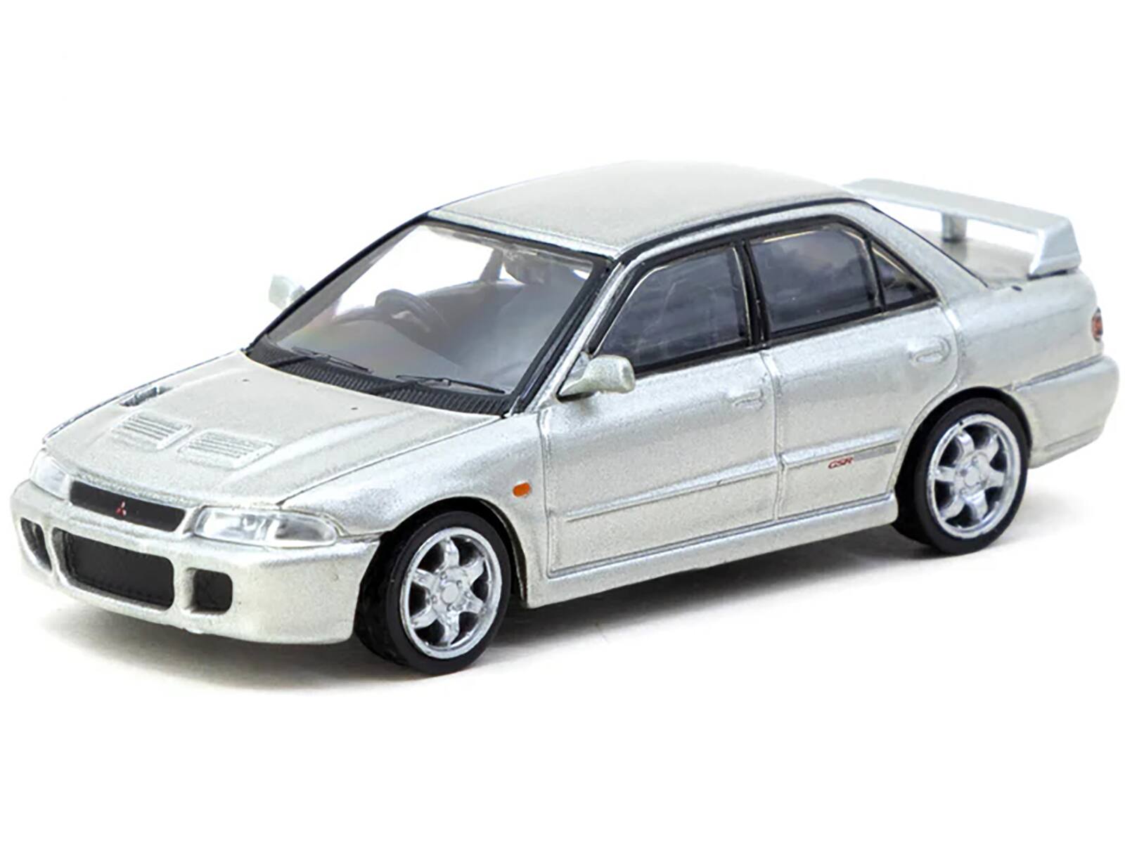 Angle. Tarmac Works - Mitsubishi Lancer GSR Evolution RHD (Right Hand Drive) Silver Metallic with Tarmac Cards Global64 Series 1/64 - Silver Metallic.