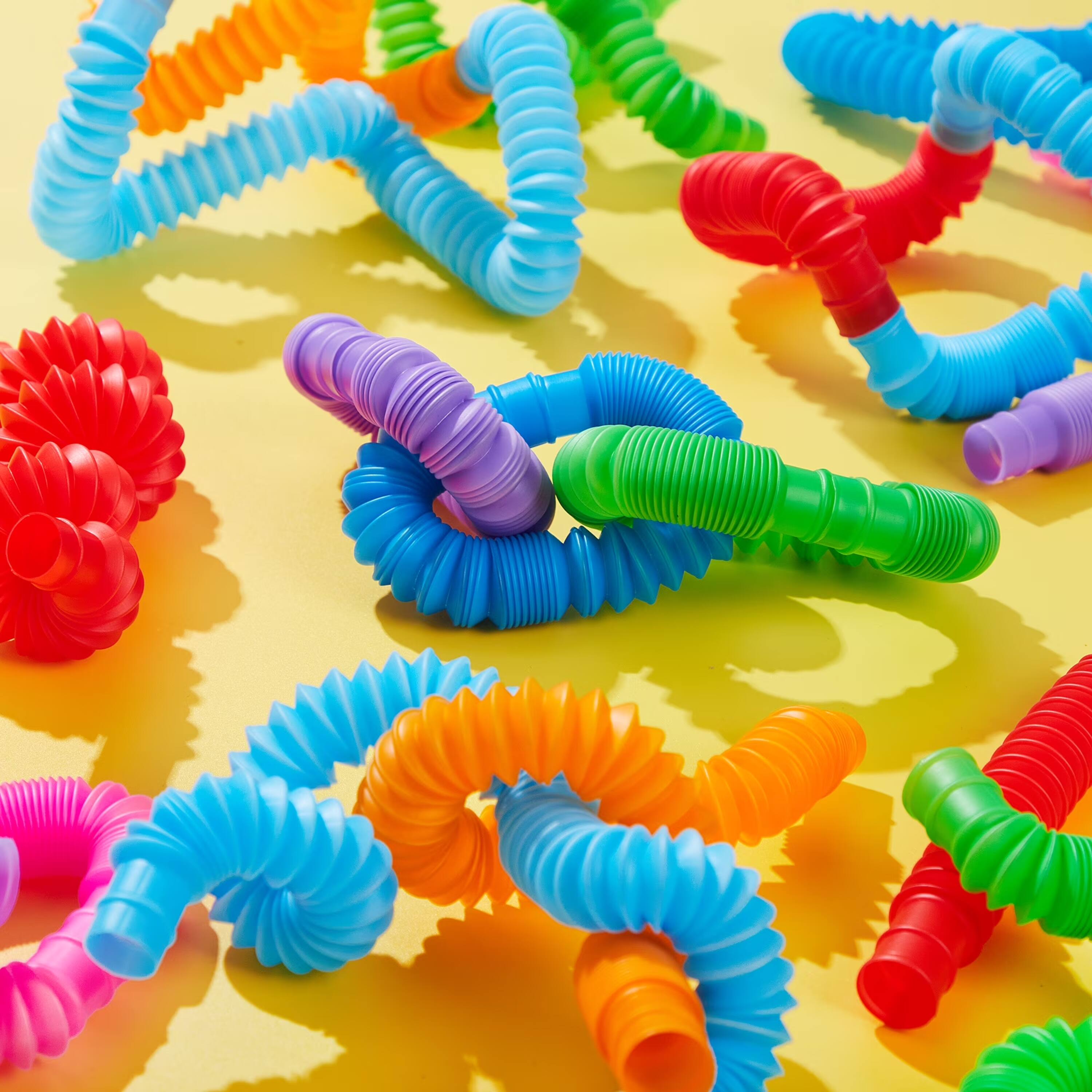 Alt View 2. Joyfy - 9 Pack Large Pop Tubes Sensory Toys Up to 27.5" Fidget Tubes Party Favors for Kids Connectable & Extendable Stress - Multicolor.