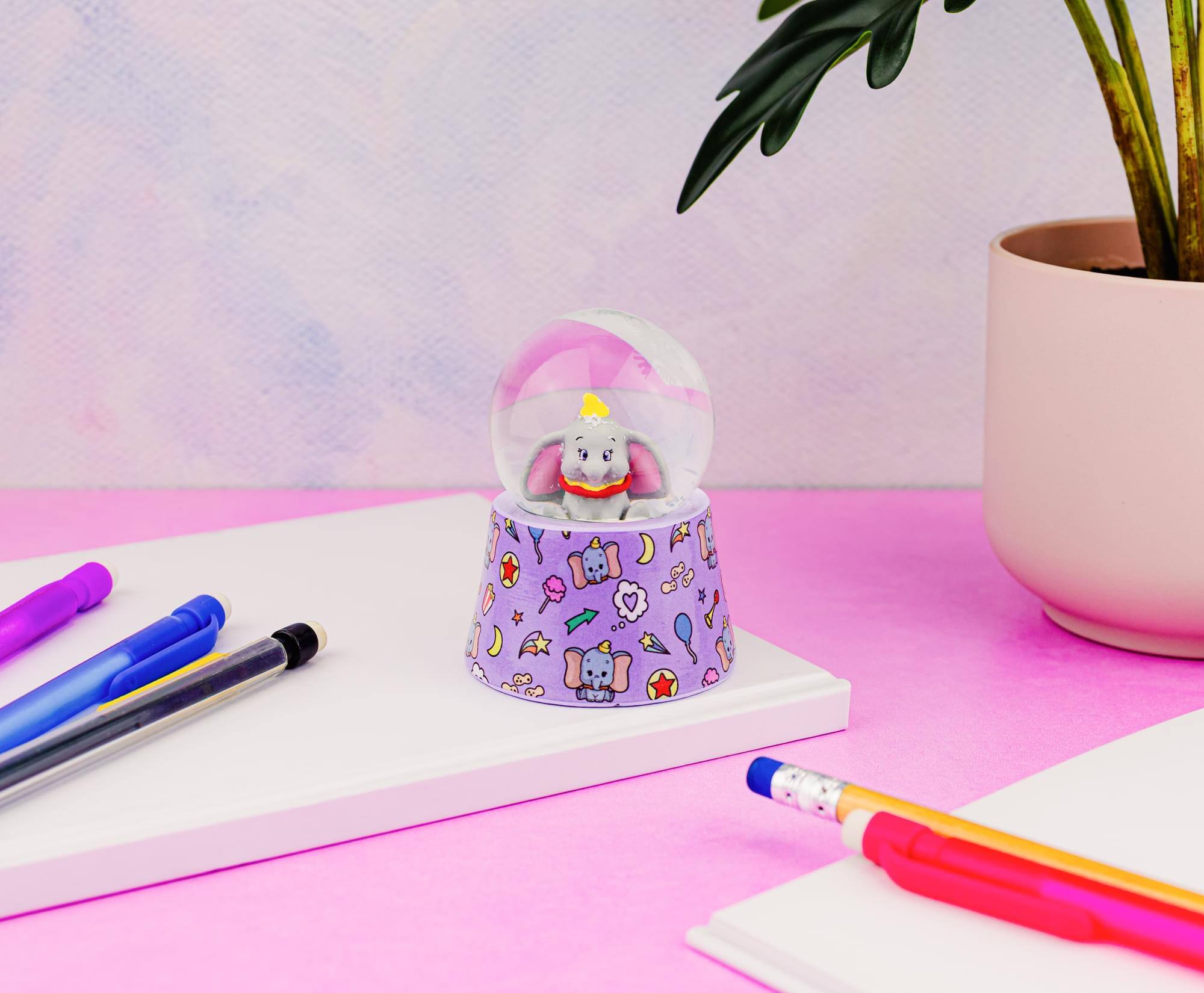 Alt View 3. Silver Buffalo - Disney Dumbo 3-Inch Mini Light-Up Snow Globe - Multi-Colored.