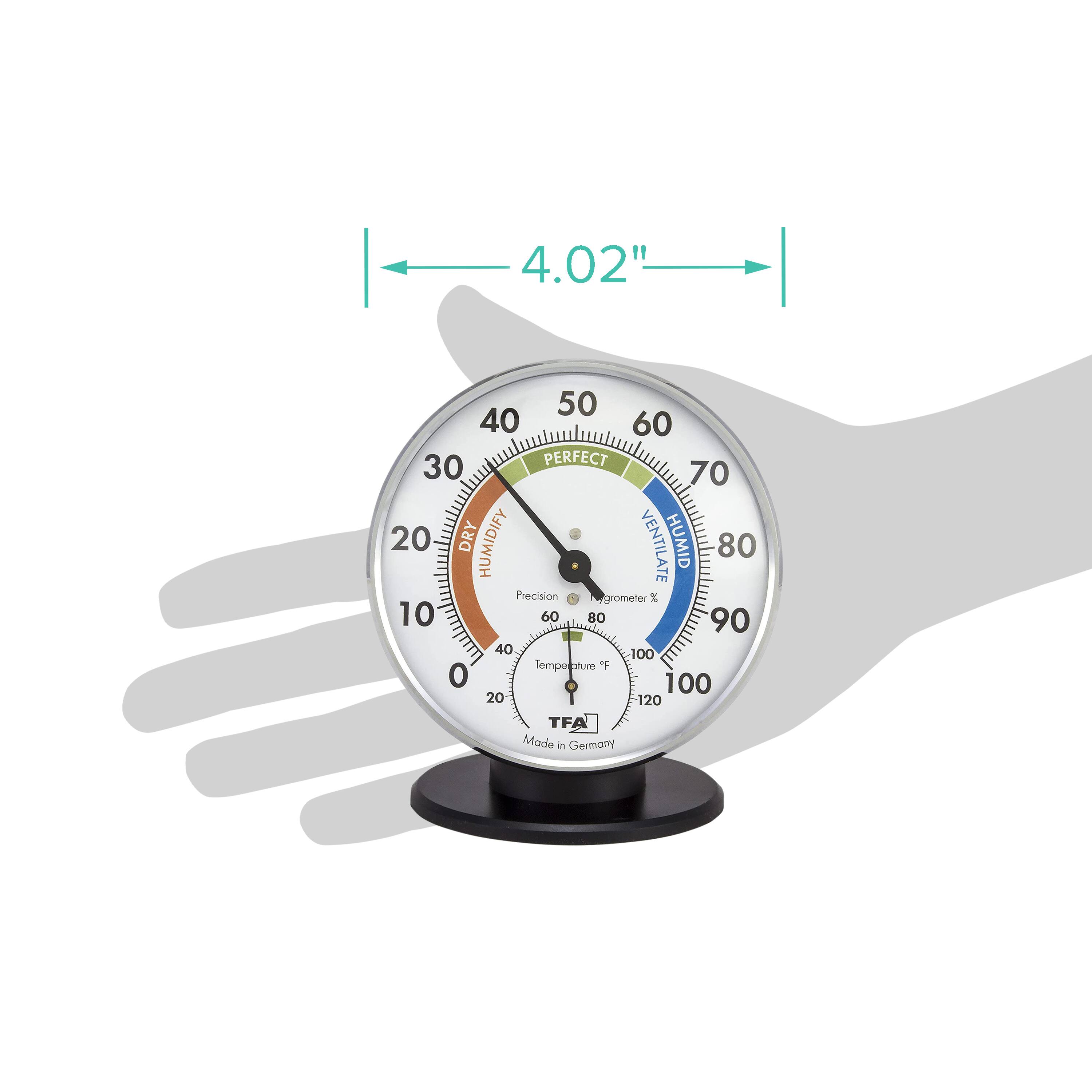 4.02"  
50 40 60 30 PERFECT 70 20 DRY HUMIDIFY VENTILATE HUMID 80  
Precision Hygrometer  
Temperature 0 100 20 120  
TFA  
Made in Germany