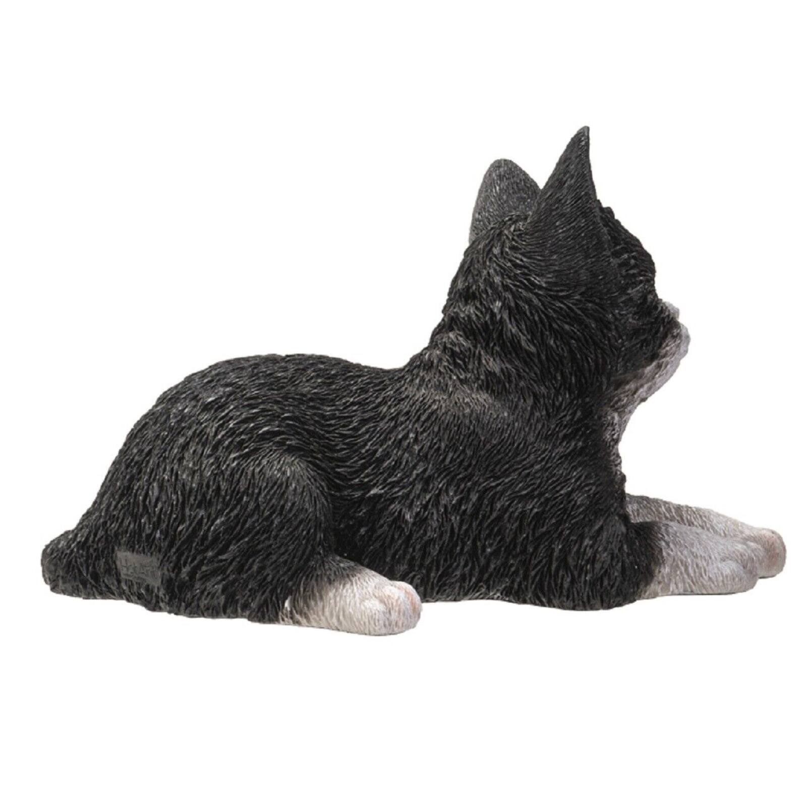 Angle. Pacific Trading - Black and White Kitty Cat Lying Down Figurine 8.5 Inch - Multicolor.