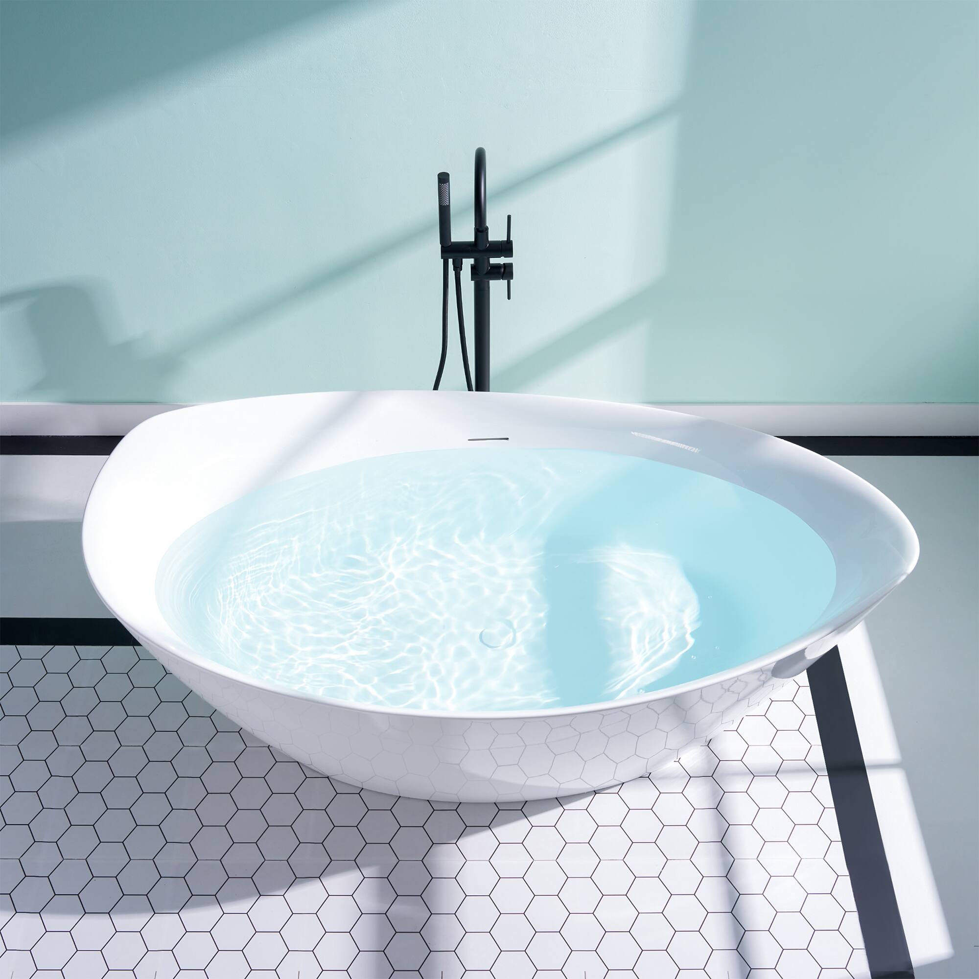 Angle. WELLFOR - Swan 70 in. x 35 in. Acrylic Soaking Bathtub with Center Drain and Overflow - White.