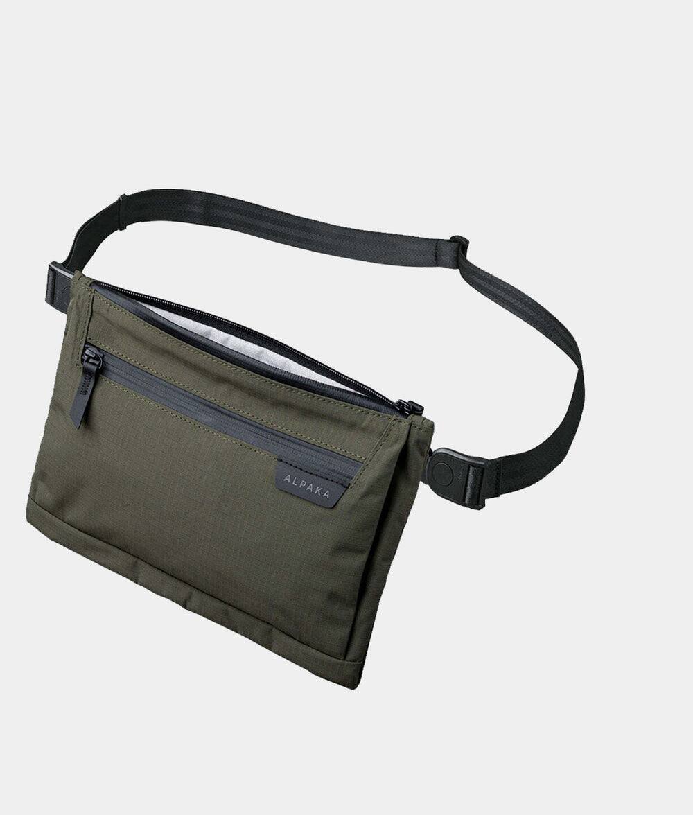 Front. ALPAKA - 2L Tech Organizer Sling Bag for iPad Mini, Zip Pouch Max V2 Crossbody Travel Bag with Expandable Storage - Green Axoflux 210D.