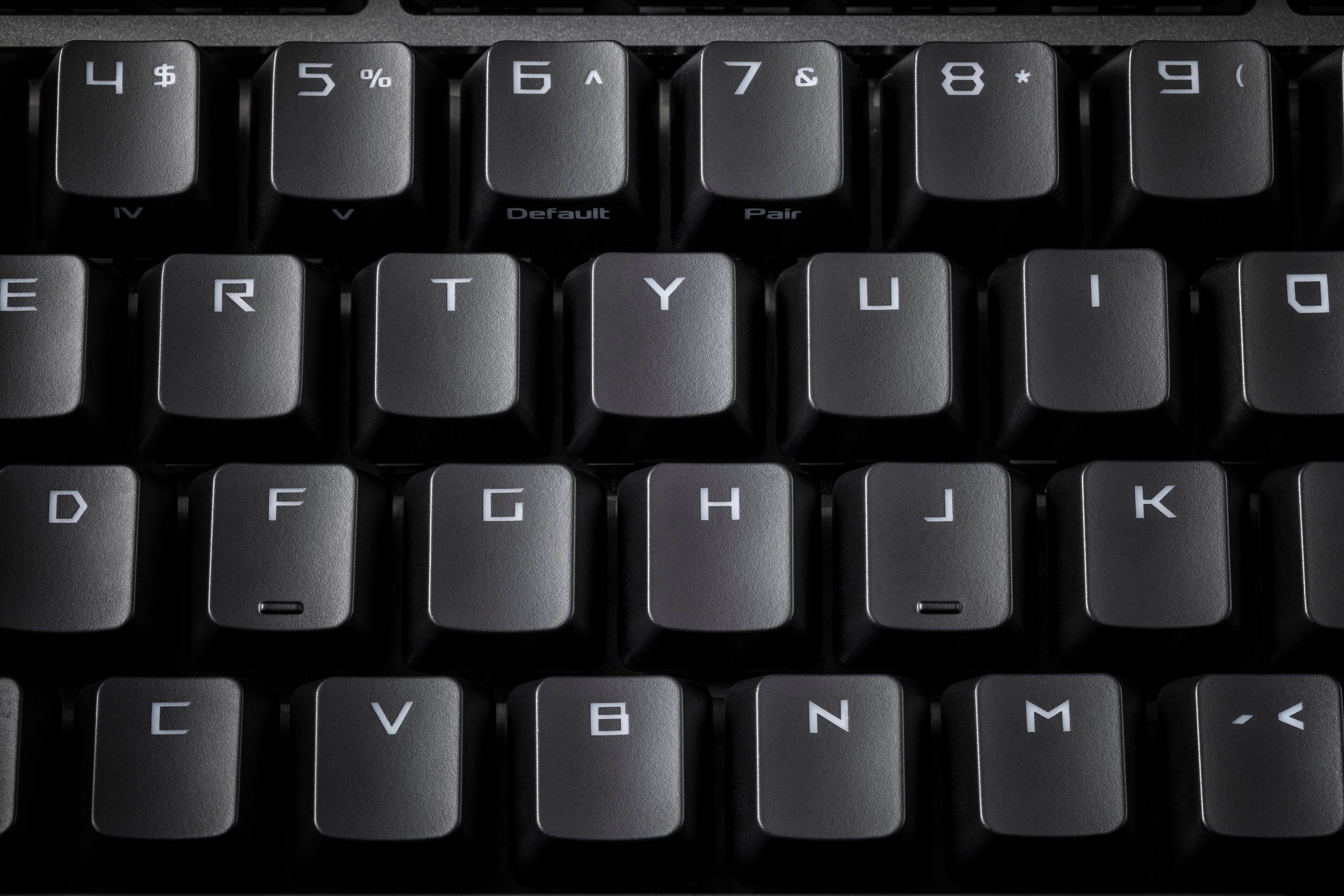 The text on the image reads:

$ 5 % ^ 7 & 8 9 ( IV V Default Pair E R T Y U I D F G H C V Z M

To group and correct the text, we can organize the keys by their respective positions on the keyboard. The keys in the image are:

1. $ (dollar sign)
2. 5% (percent sign)
3. ^ (caret)
4. 7 & 8 (ampersand and number 7 and 8)
5. 9 (number 9)
6. (IV V Default Pair)
7. E R T Y U I O P (the letters E, R, T, Y, U, I, O, and P)
8. A S D F G H J K L (the letters A, S, D, F, G, H, J, K, L)
9. C V X Z M (the letters C, V, X, Z, and M)

The corrected text would be:

$ 5% ^ 7&8 9 (IV V Default Pair) E R T Y U I O P A S D F G H J K L C V X Z M