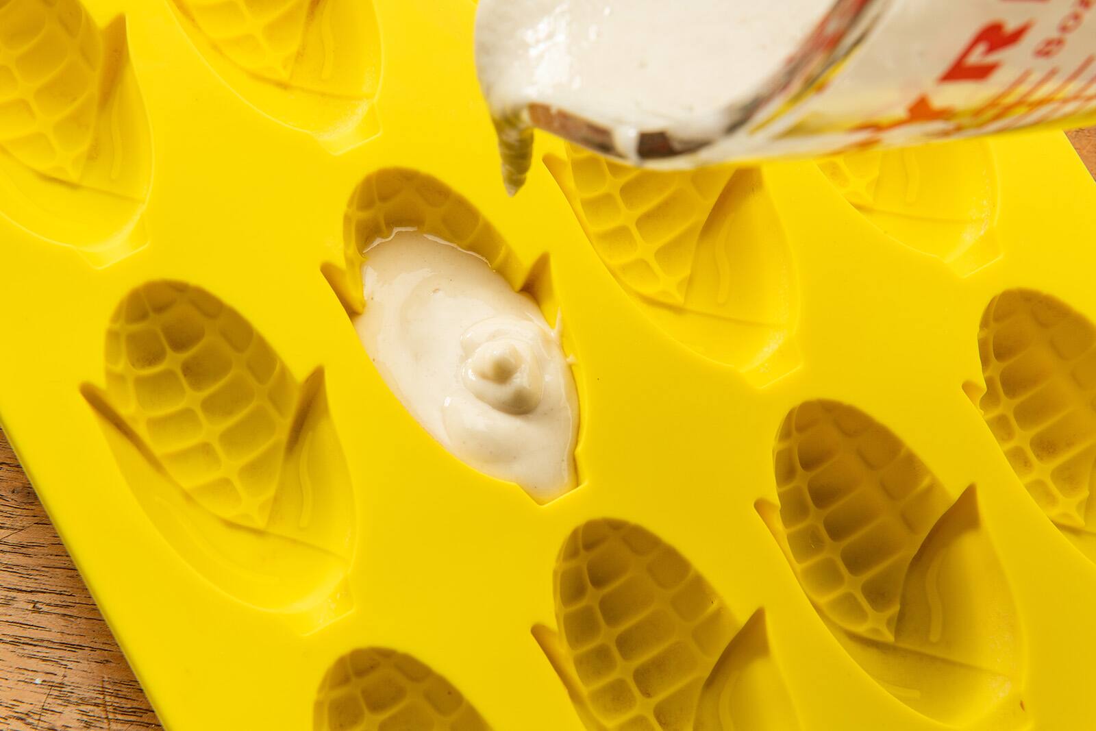 Alt View 2. MOBI - 12 Pigs in a Blanket Silicone Snack Mold, Mini Corn Dogs - Yellow.
