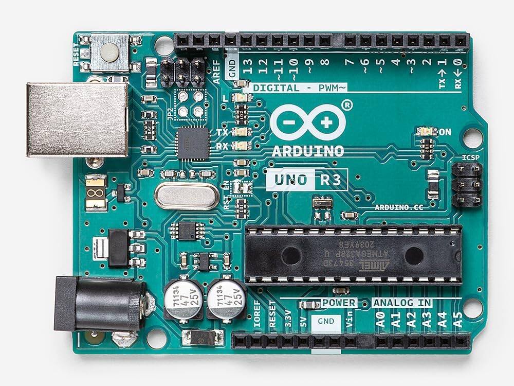 RESET JP2 !  
8 7 6 5 4 3 2 AREF GND 13 12 11 ~10 ~9 ~8  
DIGITAL - PWM~  
TX RX CE  
ARDUINO  
UNO R3  
ARDUINO  
2 T5  
1 2 2039YE8  
D ATMEGA328P  
35473D AMEL  
71134 47 25V  
IOREF RESET 3.3V 5V  
POWER ANALOG IN GND Vin A0 A1 A2 A3 A4 A5