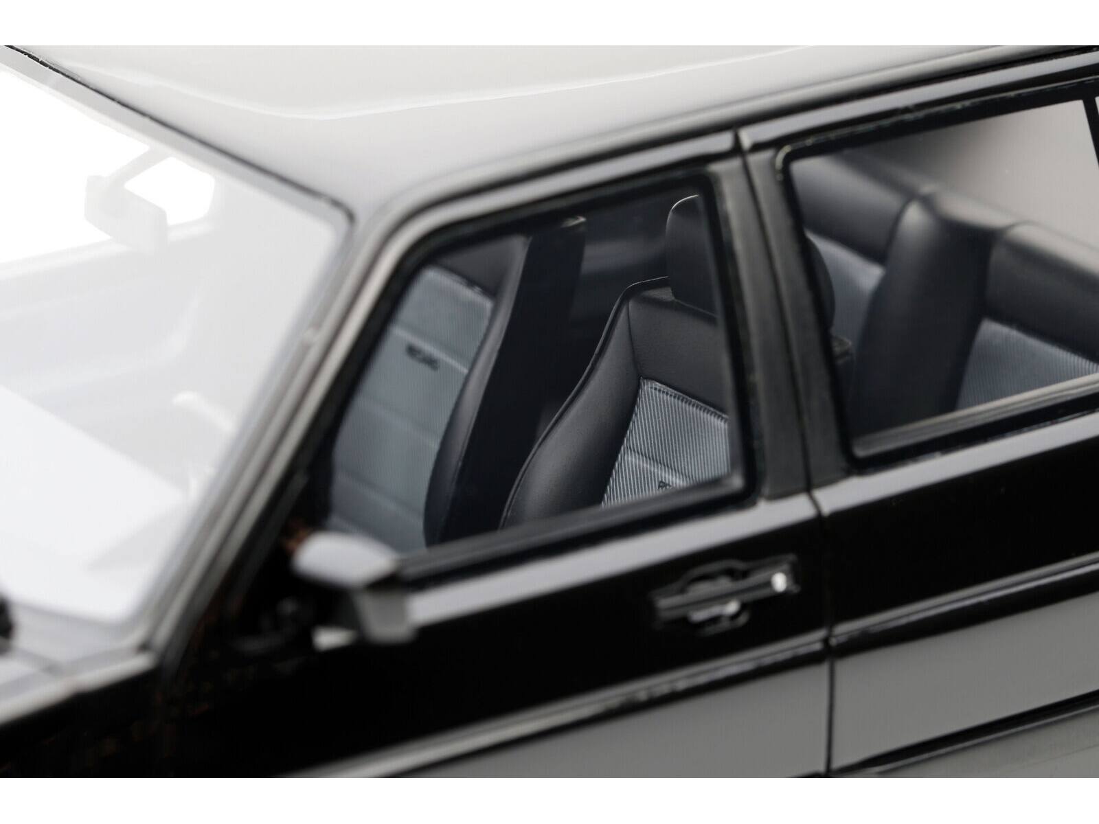 Left. Otto Mobile - 1987 Volkswagen Jetta Mk2 Black Limited Edition to 2000 pieces Worldwide 1/18 Model Car by Otto Mobile - Black.