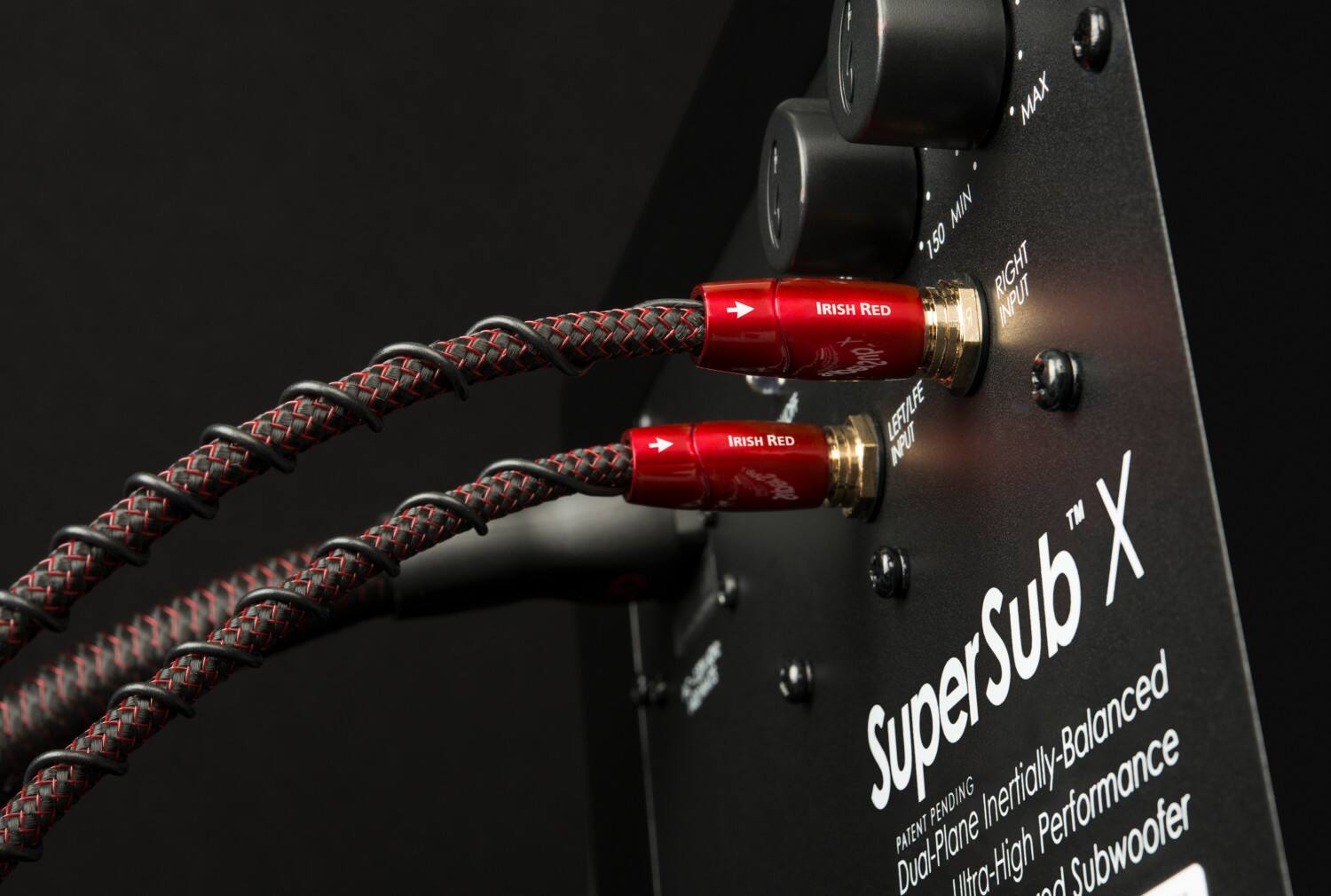 The text on the image reads:

"SuperSubX - Pending Performance - Dual-Plane - Patent Pending - High-Performance - Irish Red - MAX - MIN - 150 - RIGHT INPUT - IRISH RED - LEFT INPUT - TM - SYPERSUBX"