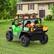 Left. Acekool - 24V 4WD Electric Ride On Dump Truck with Motorized Dump Bed, Remote Control, LED Lights, Music, Two Seater, Green - Green.