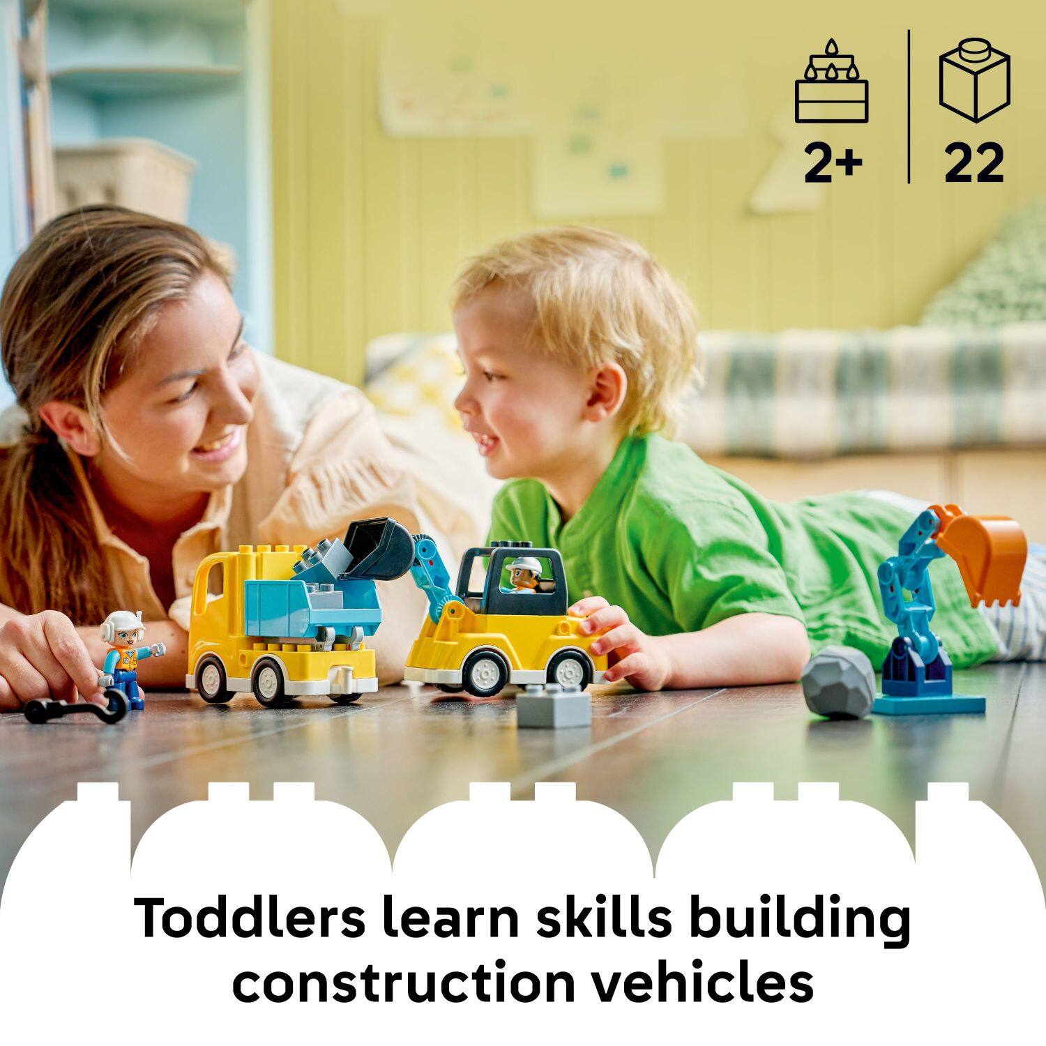 2+ 22  
Toddlers learn skills building construction vehicles
