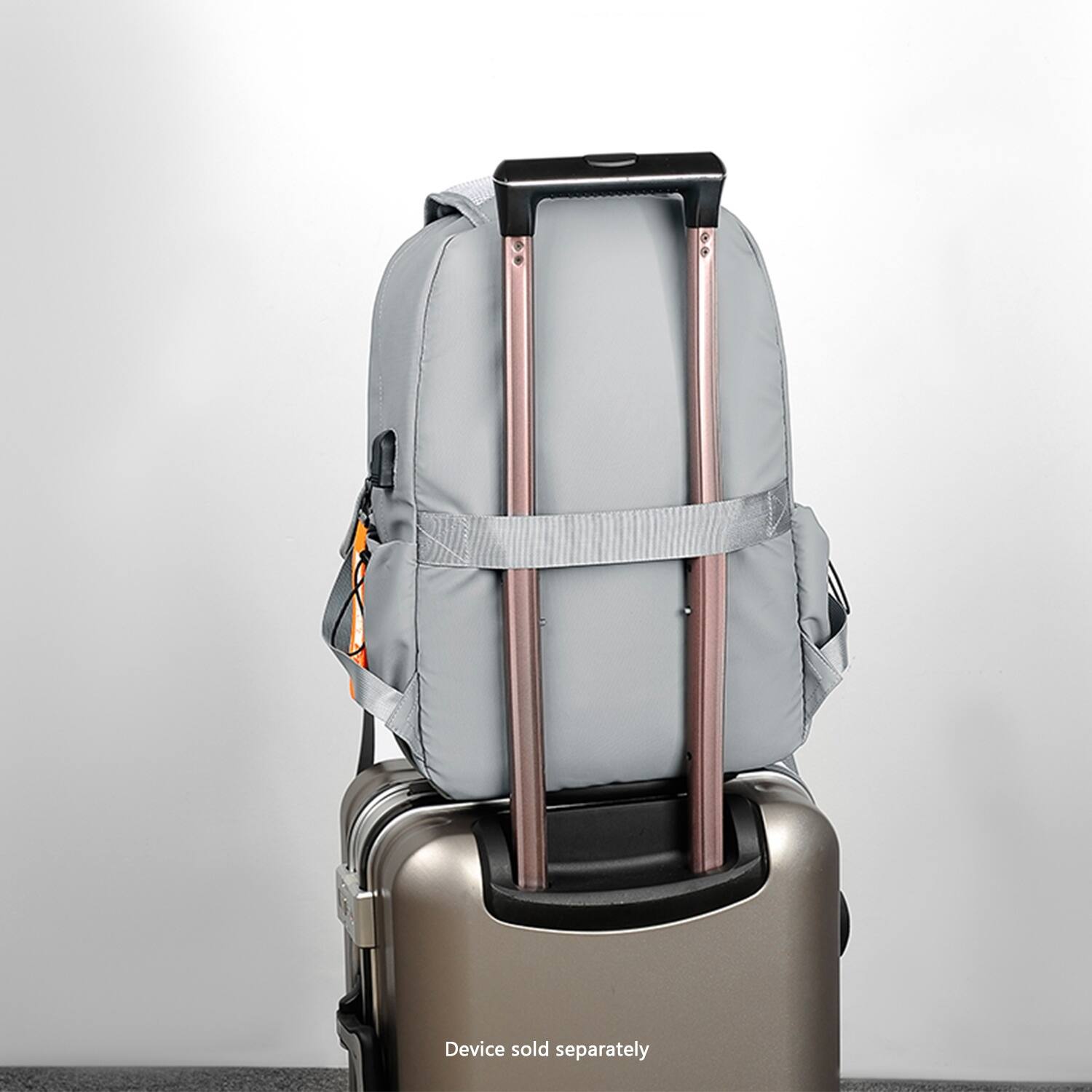 The text "Device sold separately" is displayed on the image, indicating that the backpack and the suitcase are not a complete set and that the backpack is not included with the suitcase.