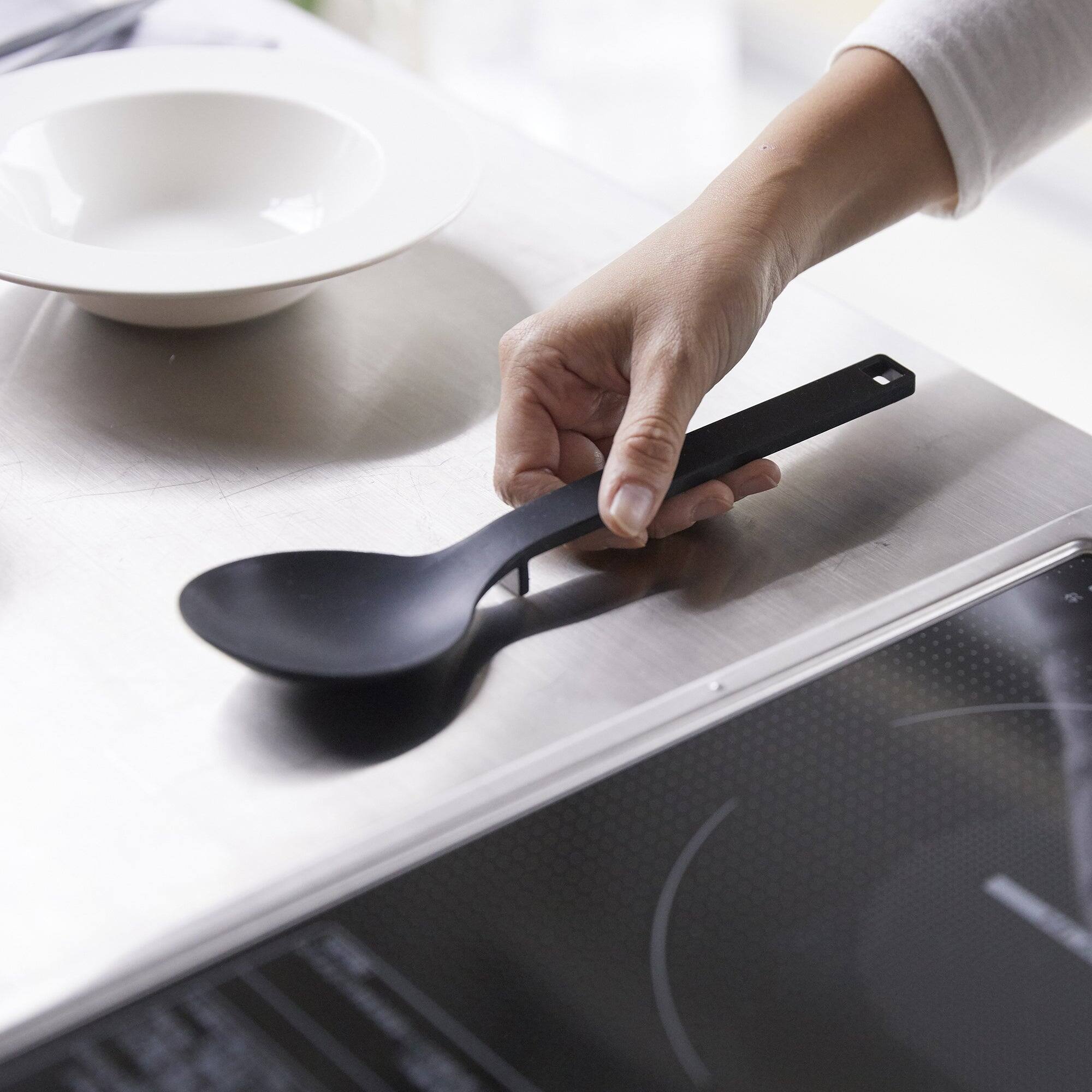 Angle. Yamazaki Home - Floating Cooking Spoon - Silicone - Black.