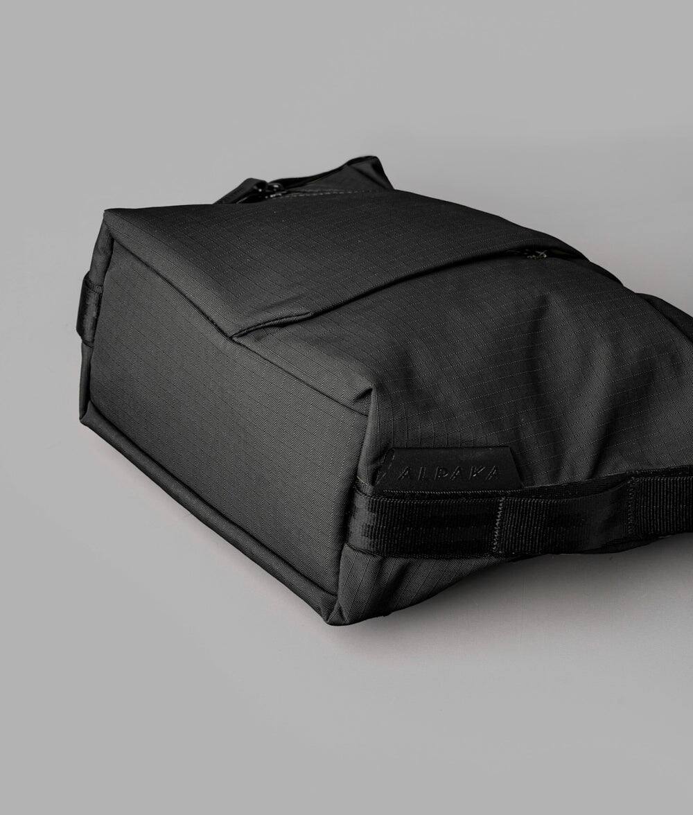 Alt View 8. ALPAKA - Flow Satchel Mini 2L Crossbody Bag, Water Resistant Shoulder Bag, Expandable Bottle Pocket, YKK Zippers - Black Axoflux 210D.