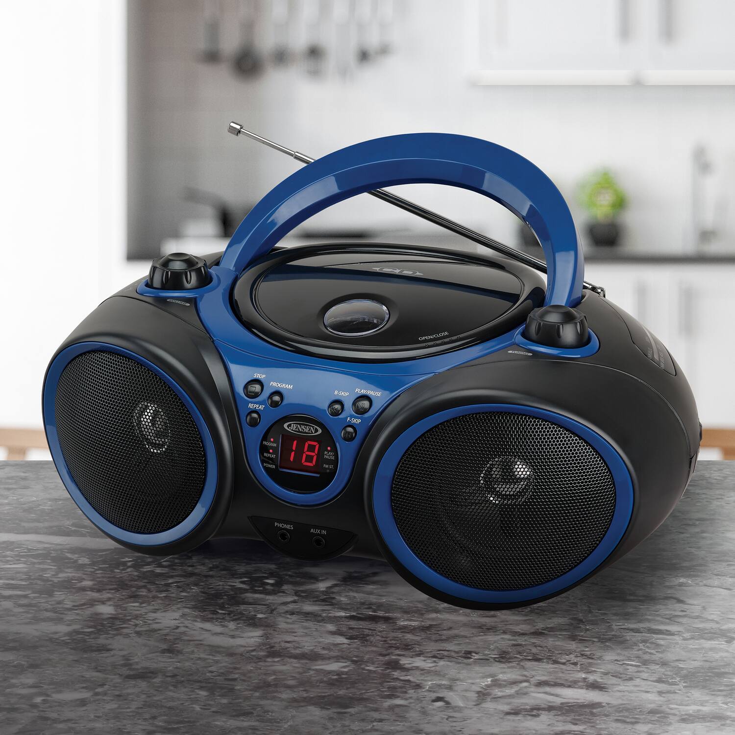 JENSEN  
PROGRAM 1  
STOP  
REPEAT  
PHONES  
AUX IN  
F-SOP  
18  
AM/FM