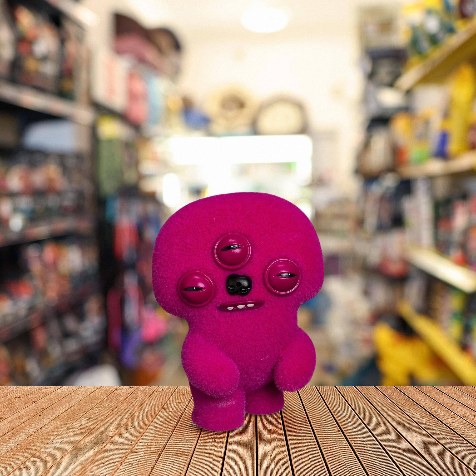 Alt View 4. ZURU - Fuggler Farting 3.5 Inch Vinyl Figure | Dark Pink Fuggler - Pink.