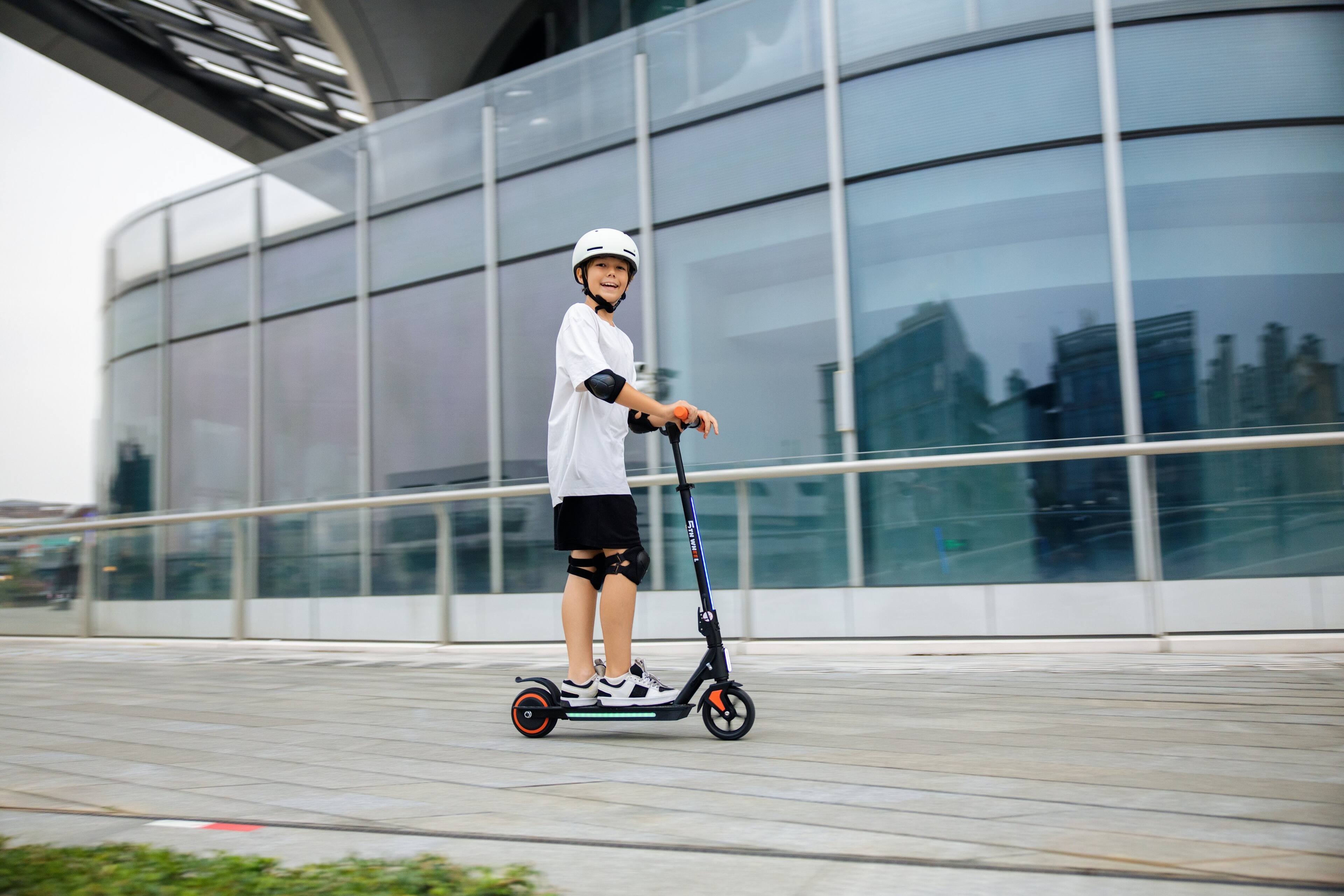 Alt View 7. 5th Wheel - K1MAX Kids Electric Scooter w/ 5 mi Max Range and 10 mph Max Speed - Black.