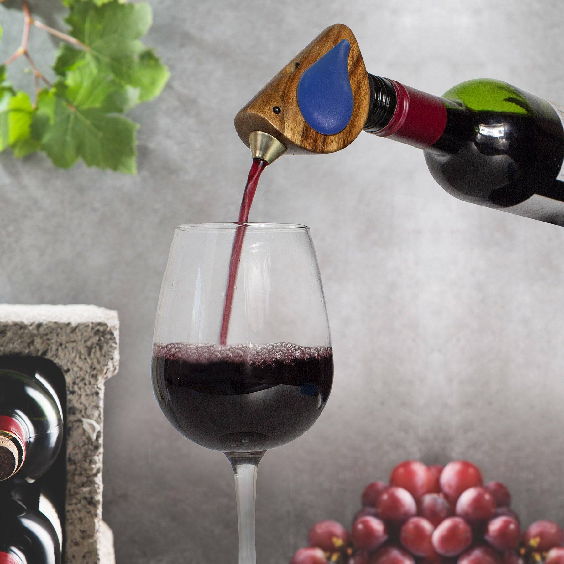 Left. Songbird Specialties - "Singing" Wine Bottle Pourer, Blue - Brown, Blue.