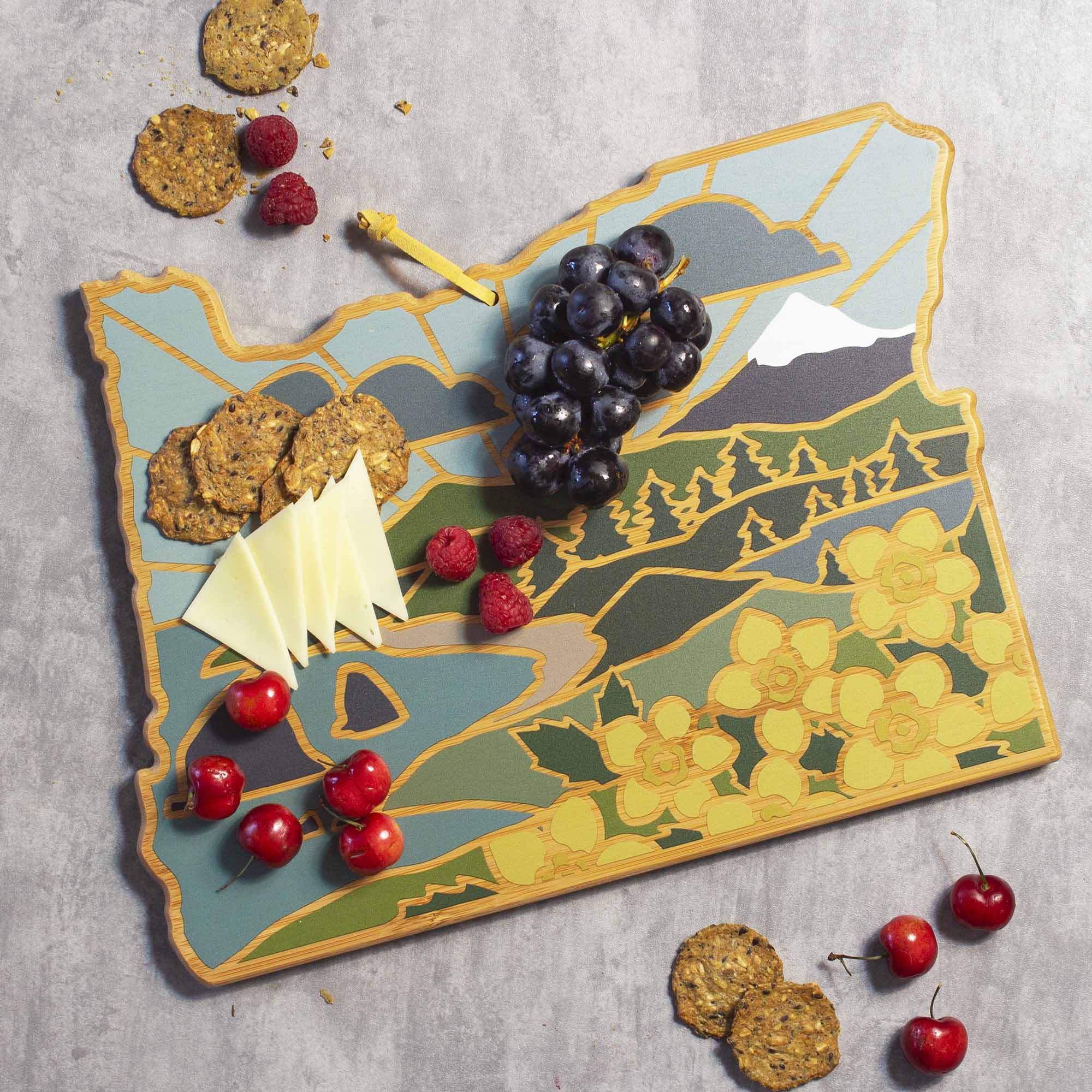 Angle. Totally Bamboo - Oregon Cutting Board with Artwork by Summer Stokes.