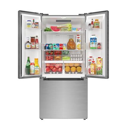 The refrigerator is full of various food items, including fruits, vegetables, and drinks. There are several bottles of juice, milk, and other beverages placed on different shelves. The refrigerator also contains a variety of fruits such as apples, oranges, and watermelon. The assortment of items in the refrigerator suggests that it is well-stocked and ready for use.