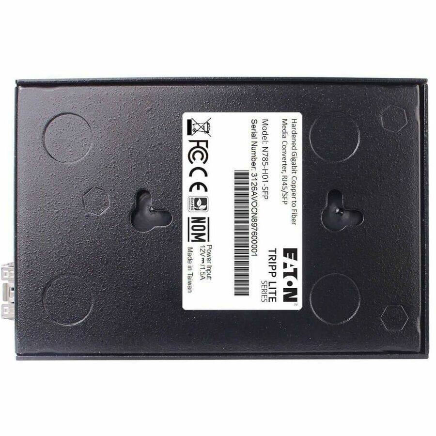 Here is the corrected and grouped text from the image:

---

**EATON TRIPP LITE SERIES**

**Hardened Media Converter: Gigabit Copper to Fiber**

**Model:** N785-H01  
**Serial Number:** 3126AV0CN897600001

**Power Input:** 12V DC, 1.5A  
**Made in Taiwan**

**FCCE NOM**  
**Made in Taiwan**

**Certifications:**  
- FCC  
- CE  
- RoHS

**Specifications:**  
- Media Converter: Gigabit Copper to Fiber  
- Model: N785-H01  
- Serial Number: 3126AV0CN89760001  
- Input: 12V DC, 1.5A