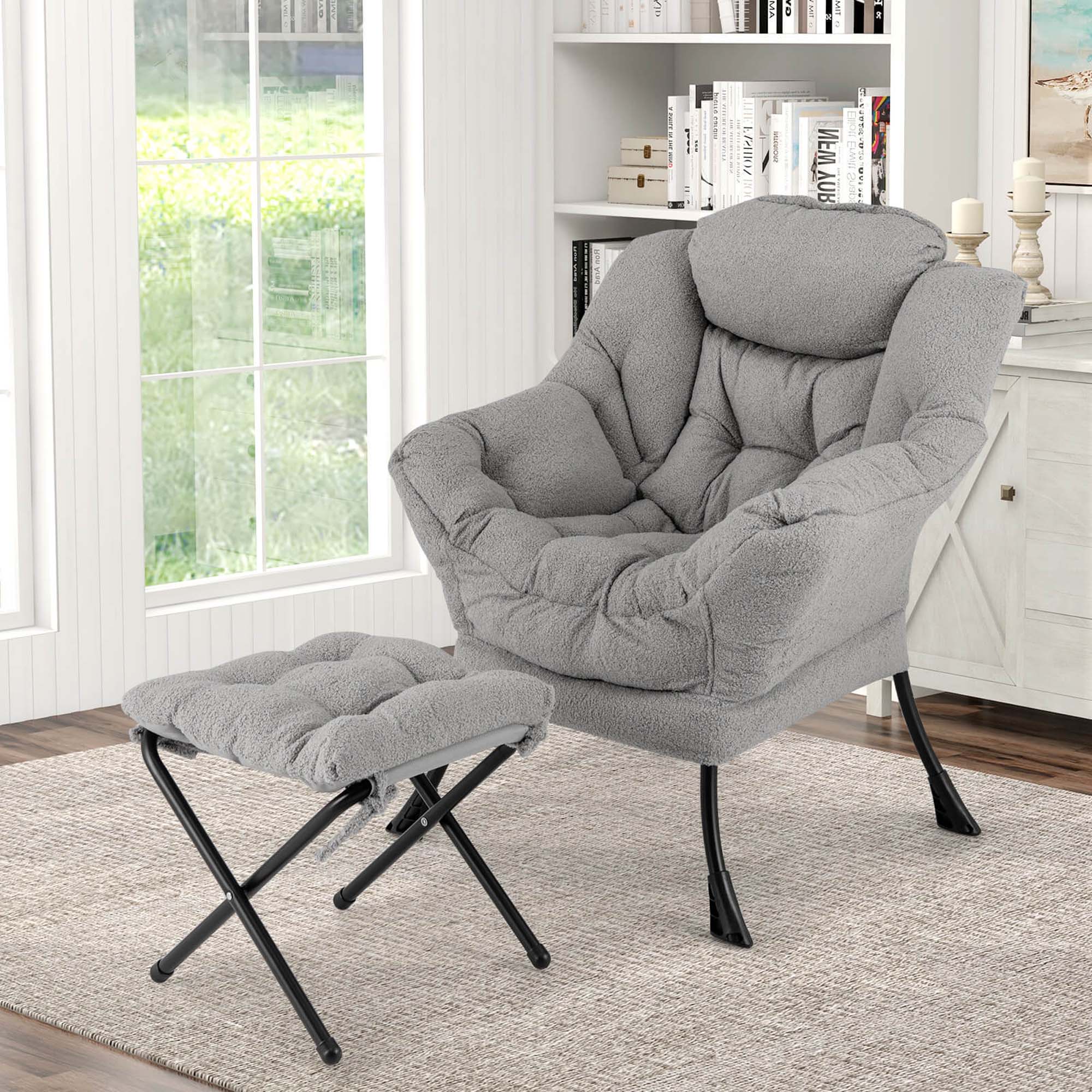 I have grouped the text and corrected it as follows:

"I have a grey chair that is very comfortable. It is a recliner and has a foot rest. The chair is situated in front of a window, and there are books on a shelf nearby. The chair is positioned on a rug, and it is accompanied by a matching ottoman."