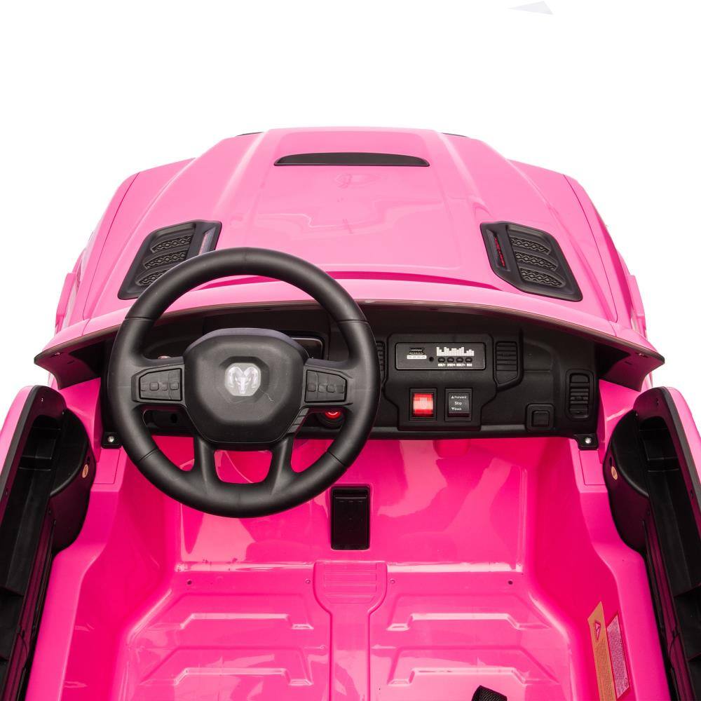 Left. BreeBe - 24V Licensed Dodge RAM 2500 2-Seater Kids Ride On Truck w/ Remote, 2WD, Suspension, Storage, Bluetooth, USB, Ages 3-6 - Pink.
