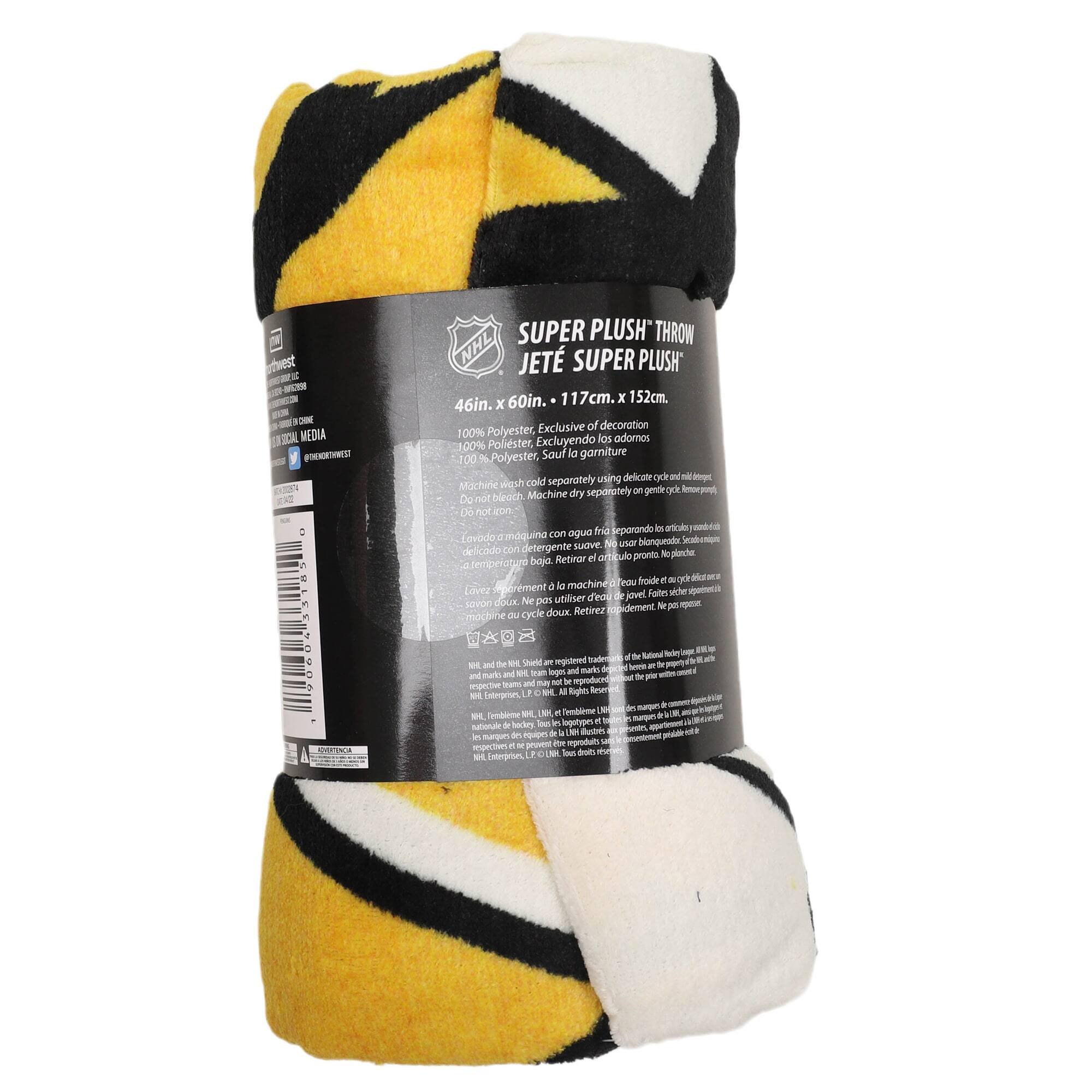 Sure, here is the corrected and grouped text from the image:

---

**SUPER PLUSH THROW**  
**JETE SUPER PLUSH**  
**46in. x 60in.**  
**117cm. x 152cm.**

**100% Polyester**  
**Exclusive of decoration**  
**100% Poliester**  
**Excluyendo los adornos**  
**100% Polyester, sauf la garniture**

**Machine wash cold separately**  
**Do not bleach**  
**Do not tumble dry**  
**Lavado a máquina con agua fría, separadamente**  
**No usar blanqueador**  
**No secar en secadora**  
**Retirar e amarillo pronto a planchar a temperatura baja**  
**Lavage à la machine à eau froide, séparément**  
**Ne pas blanchir**  
**Ne pas sécher en machine**  
**Retirer l'amarillo rapidement à plat à température basse**

**NHL and the NHL Shield are registered trademarks of the National Hockey League. All Rights Reserved.**  
**NHL Enterprises, L.P