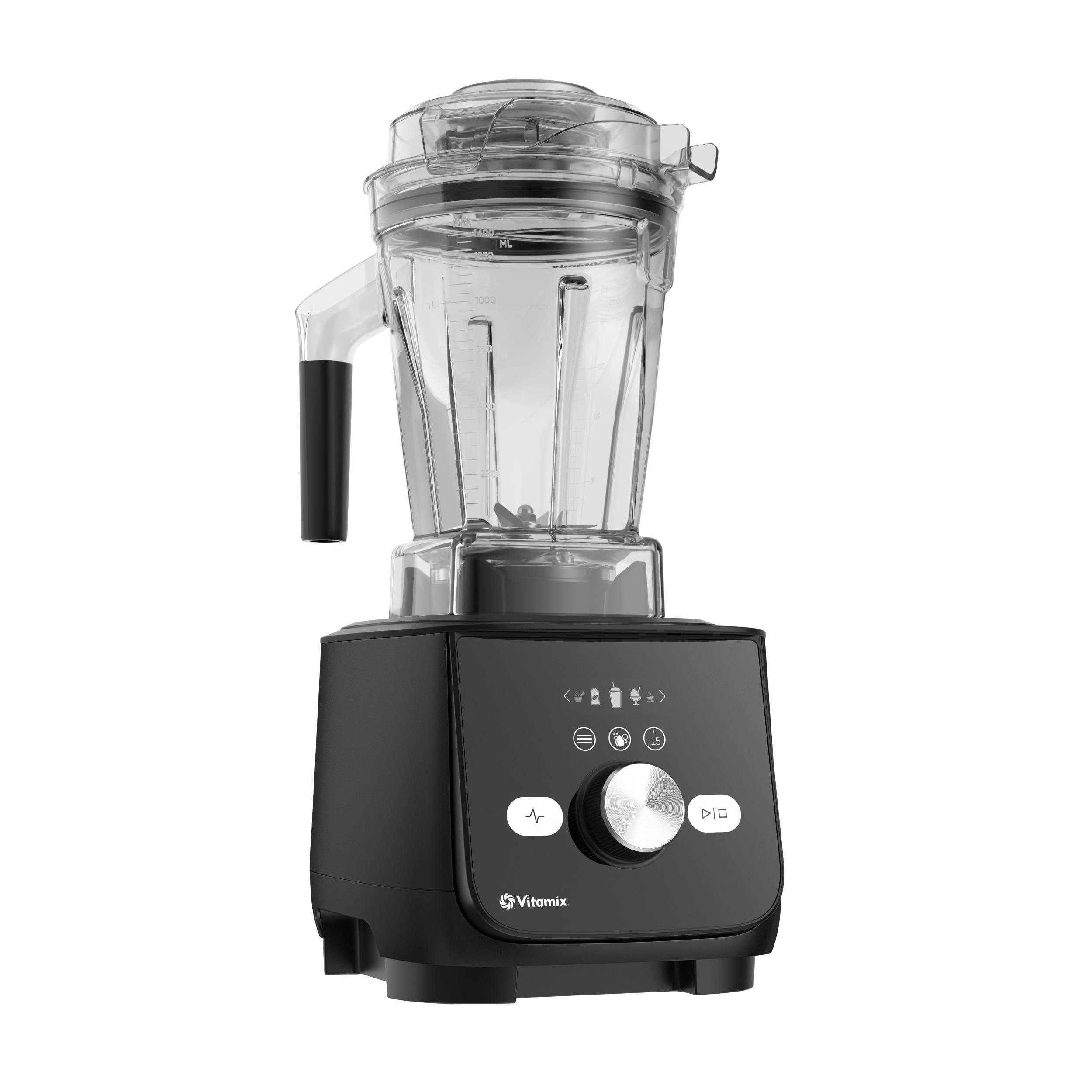The image features a Vitamix blender with a black base and a clear container. The blender is filled with ingredients, and it is ready to be used. The blender is designed for easy operation, with a simple control panel and a large, easy-to-read display. The Vitamix blender is perfect for making smoothies, shakes, and other blended beverages.