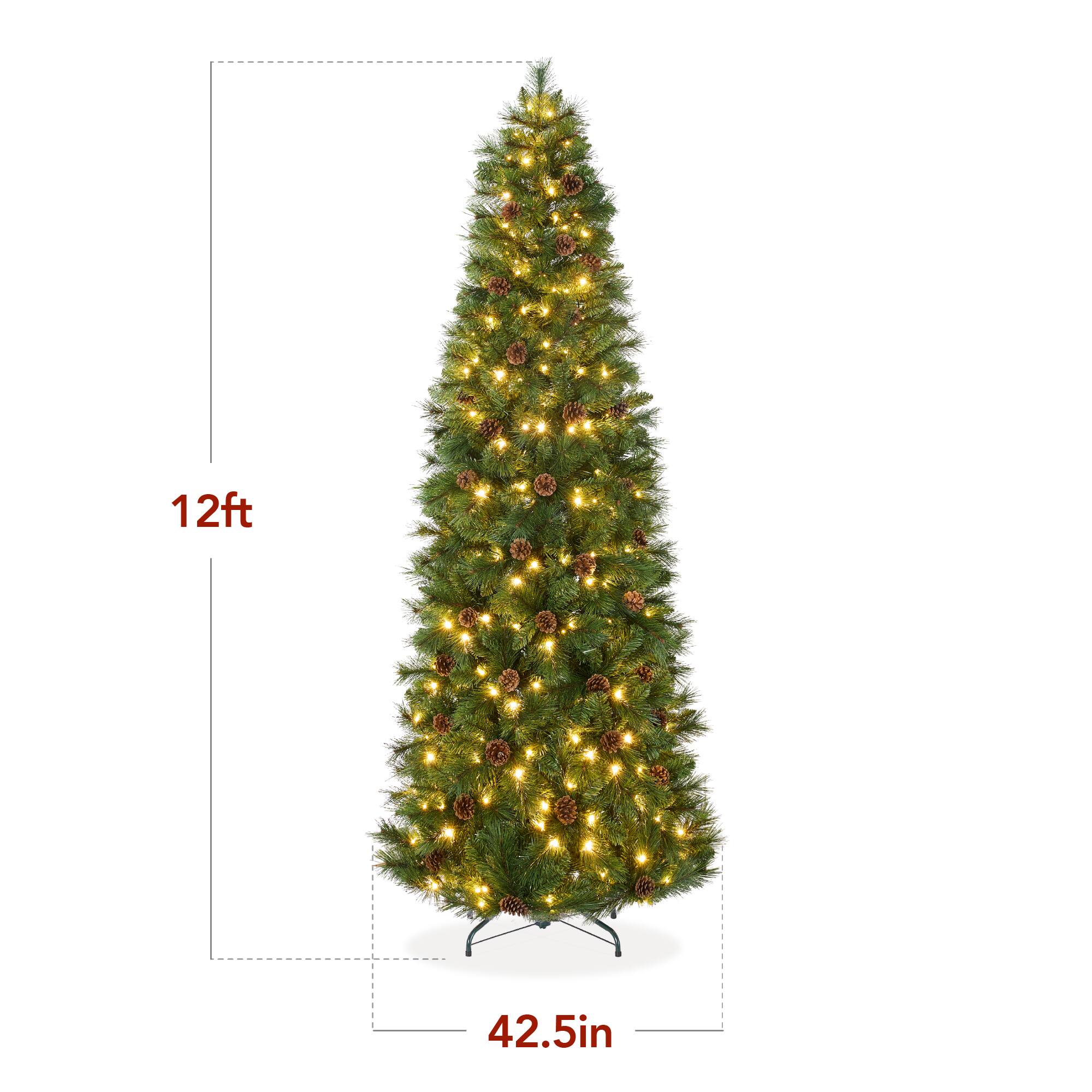 The text on the image indicates the dimensions of the Christmas tree as follows:

- Height: 11 feet 2 inches
- Width: 42.5 inches
- Depth: 5 inches

So, the corrected text is: 11ft 2in 42.5in 5in.