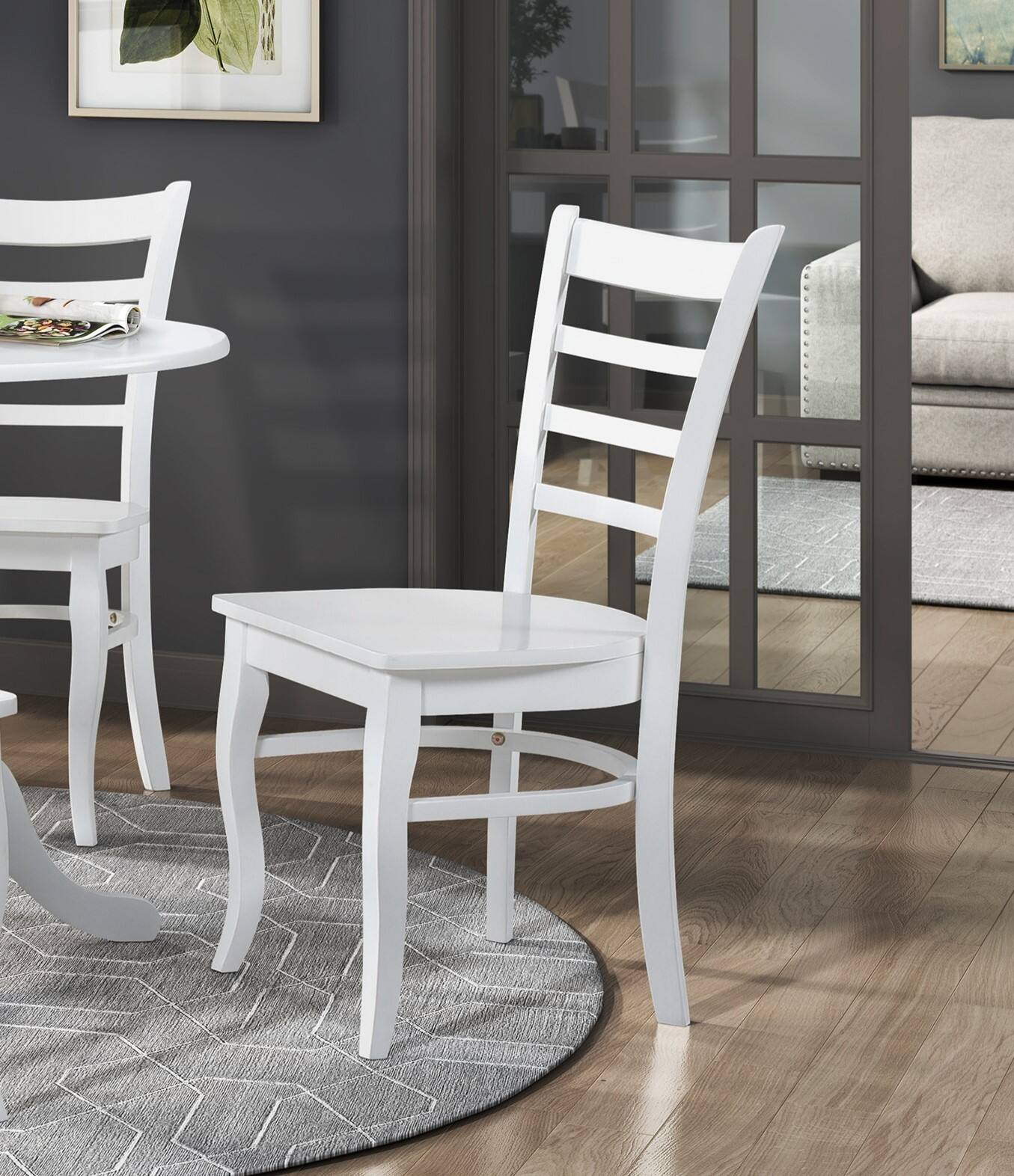 Left. TinyHomie - White 3pc Set Round Table and Two Chairs Set Wooden Ladder-Back Casual Farmhouse Style Kitchen Dining Room Furniture - White.