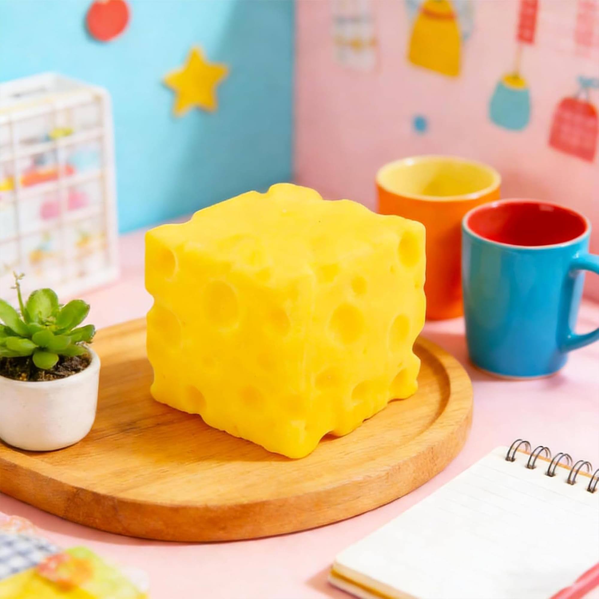 Alt View 3. Puka Creations - Cheese Squishy 2-Inch Stress Reliever | 1 Piece - Yellow.